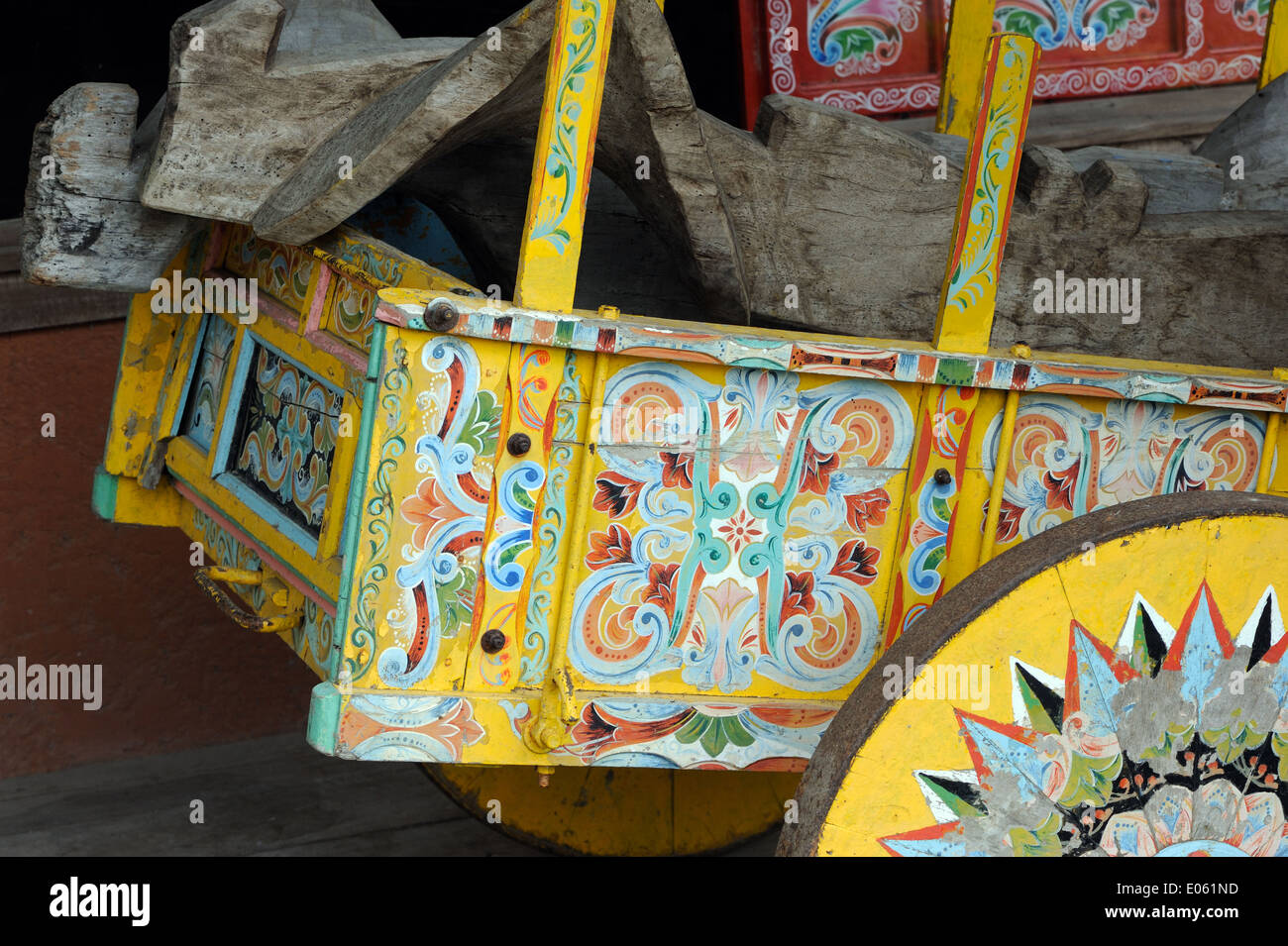 Solid wooden wheel of a traditional Costa Rican decorated ox cart, carreta. Th Stock Photo