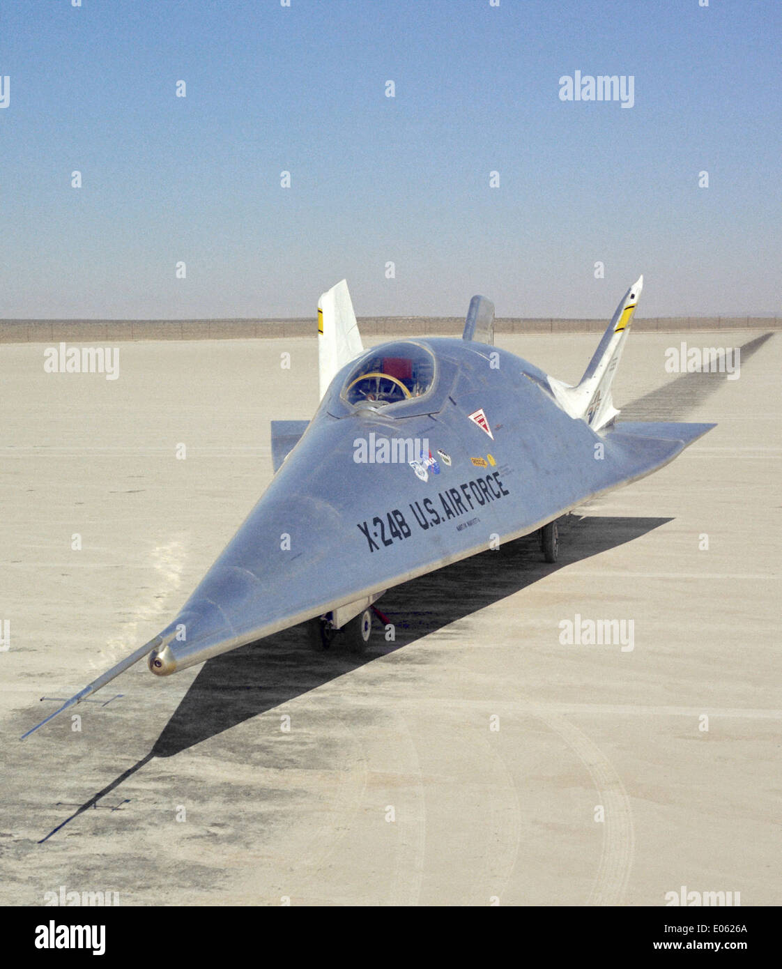 The NASA X-24B lifting body aircraft is photographed on a lakebed ...