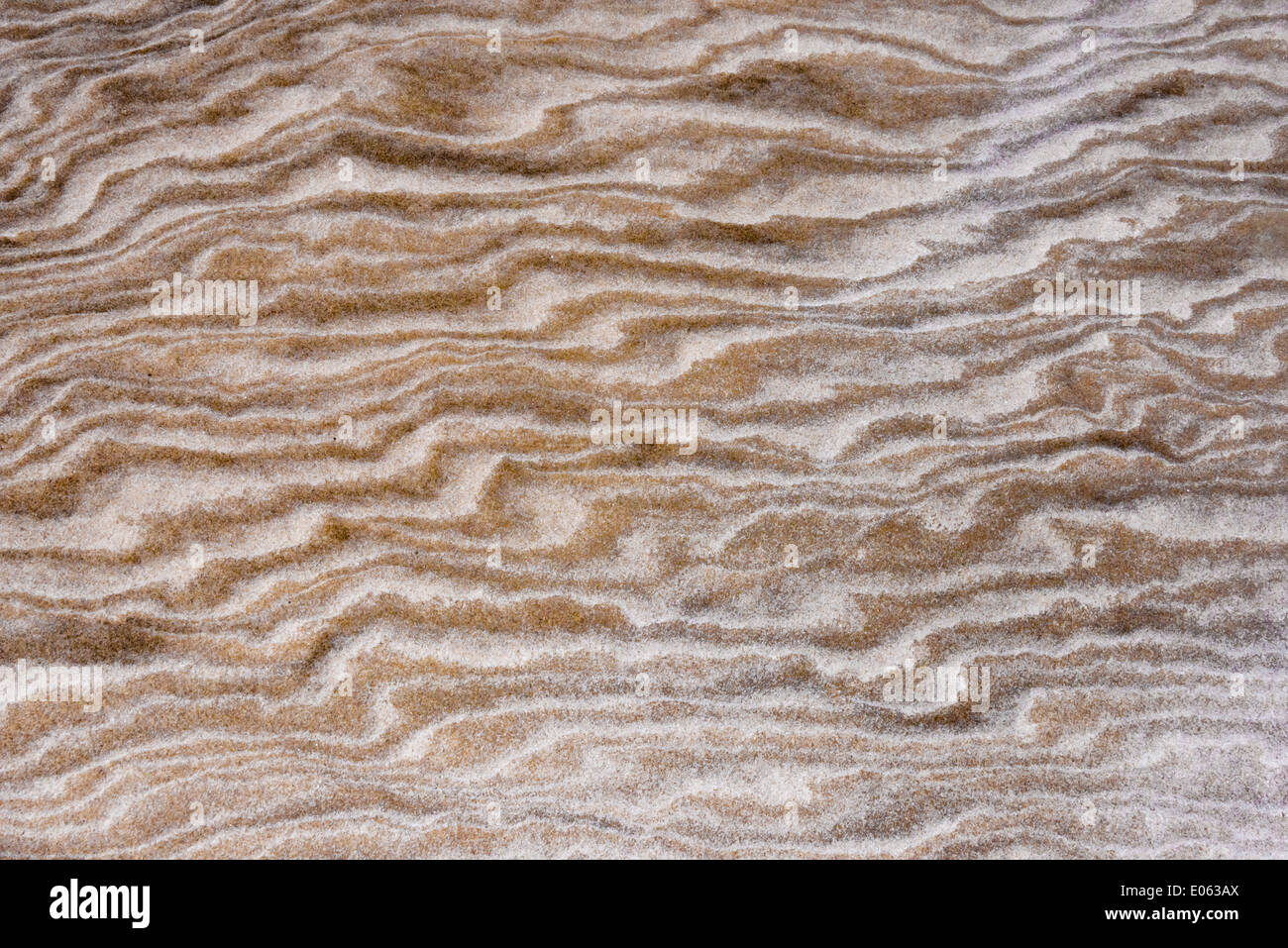 Pattern washed out by rain on sand dune resembling painting, Lencois Maranheinses National Park, Maranhao State, Brazil Stock Photo