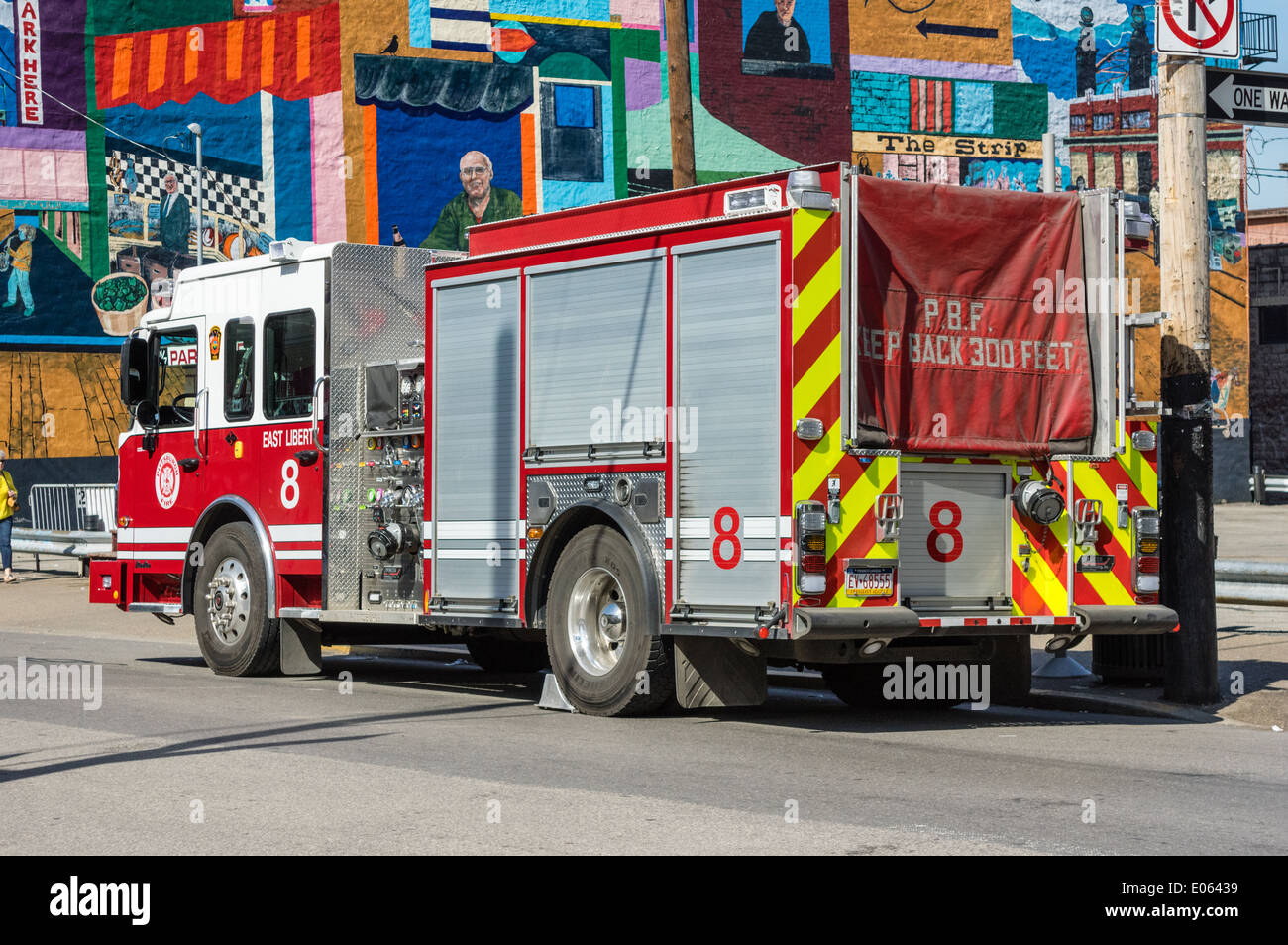 Pittsburgh Fire truck parked in front of mural. Strip District