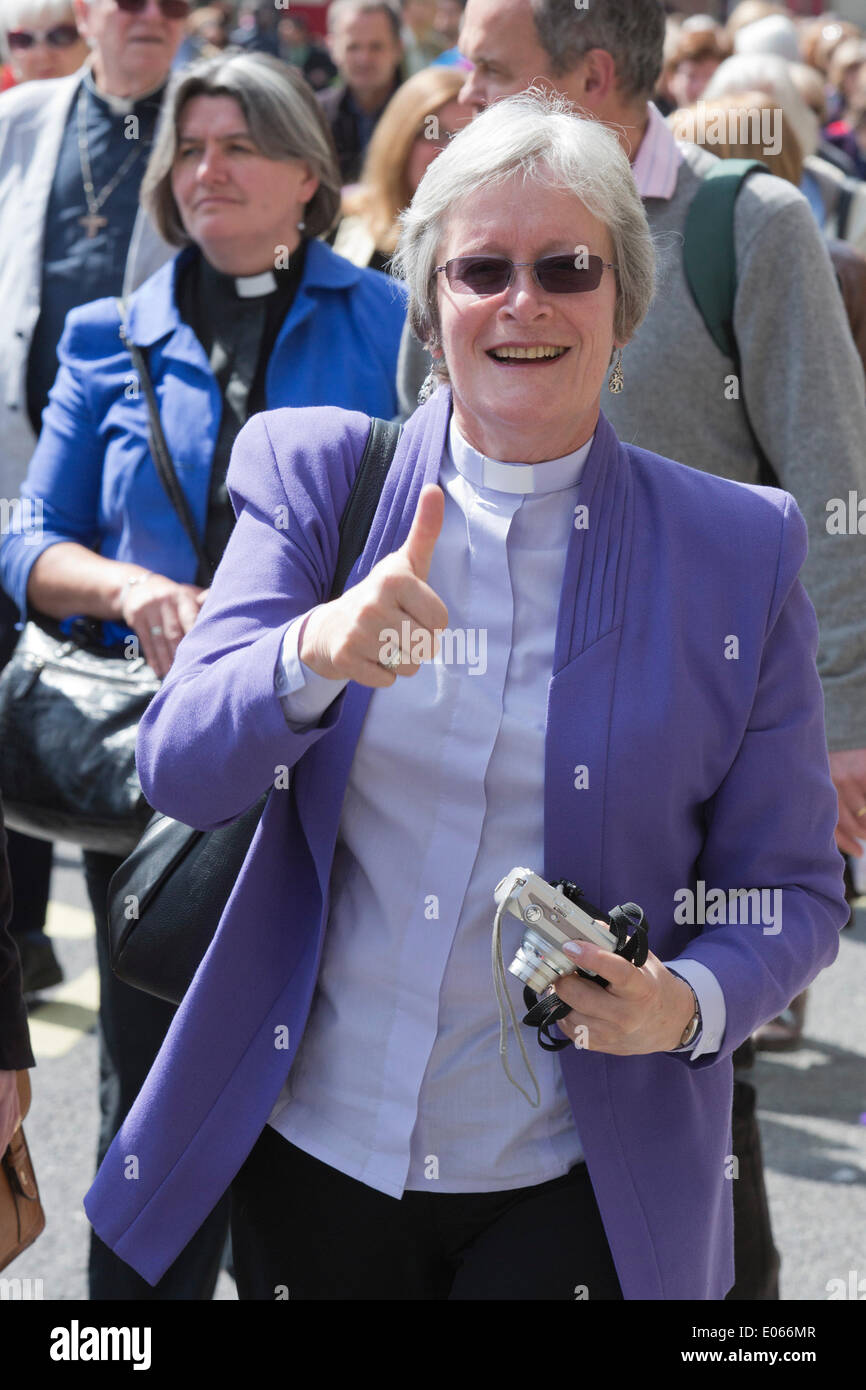 London, UK. 3 May 2014. More than 600 women ordained as priests in the first wave of female ordinations marched from Westminster to a service at St Paul's Cathedral held by Marcus Welby, Archbishop of Canterbury on the 20th anniversary of the ordination of women in the Church of England. Credit:  Nick Savage/Alamy Live News Stock Photo