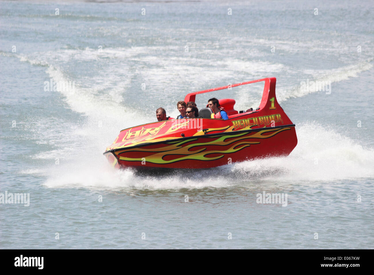 Vacationers take an exciting ride on a jet boat in Myrtle Beach, South Carolina USA. Stock Photo