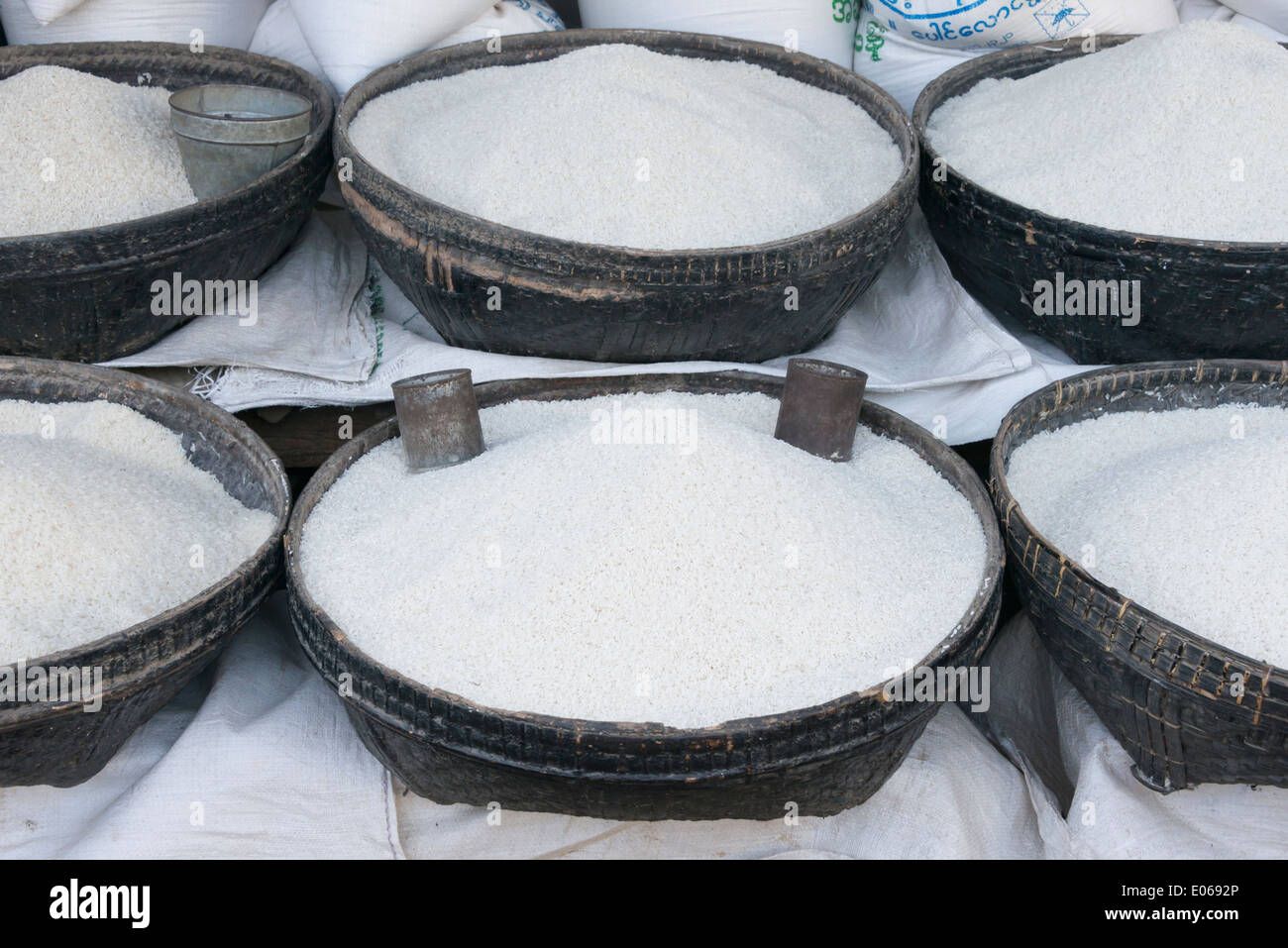 Selling rice in basket at the market, Bagan, Myanmar Stock Photo