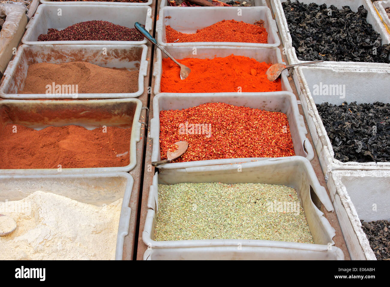 Colorful spices displayed in an informal market, China Stock Photo