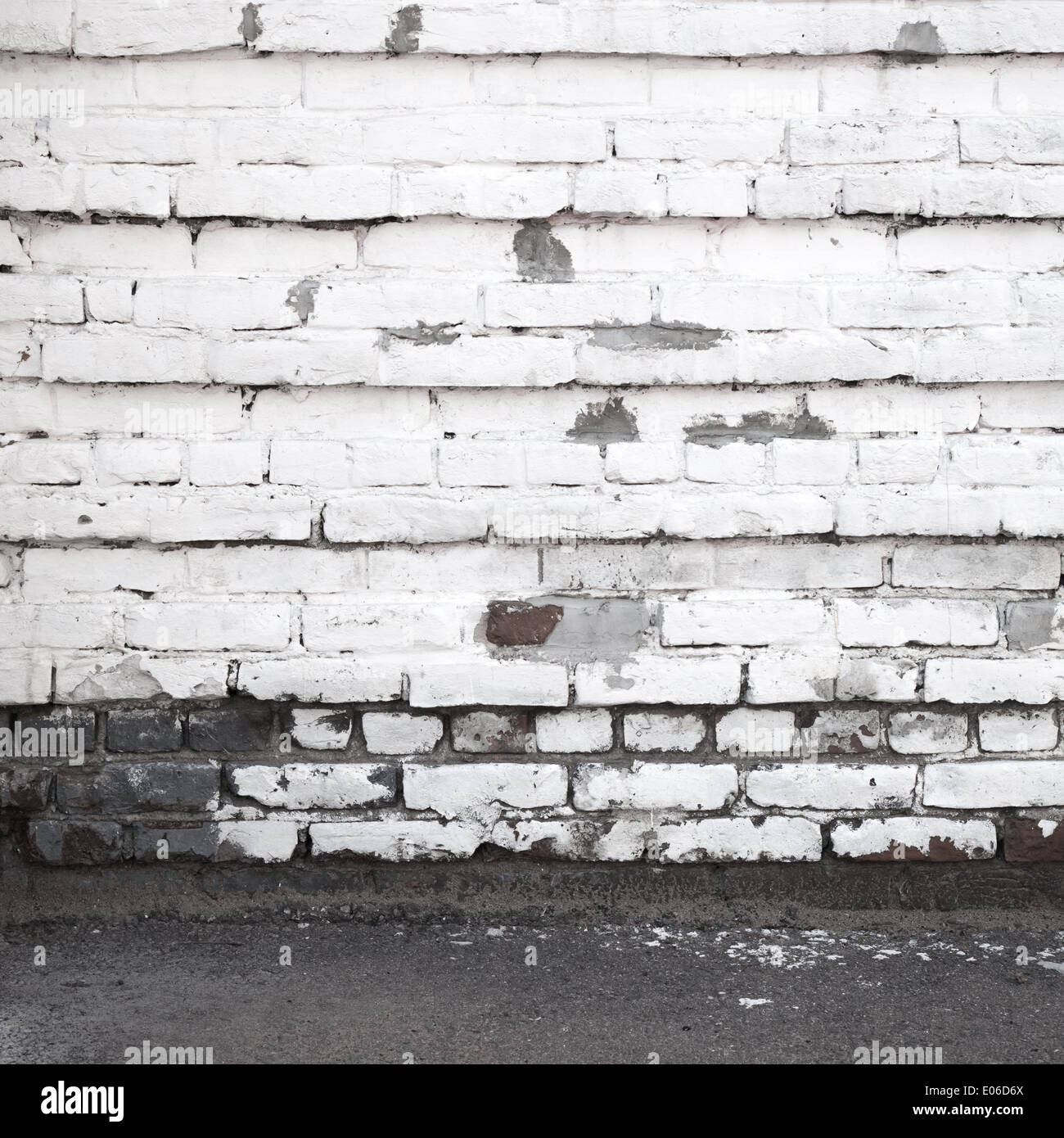 Urban background interior with old white brick wall and asphalt Stock ...