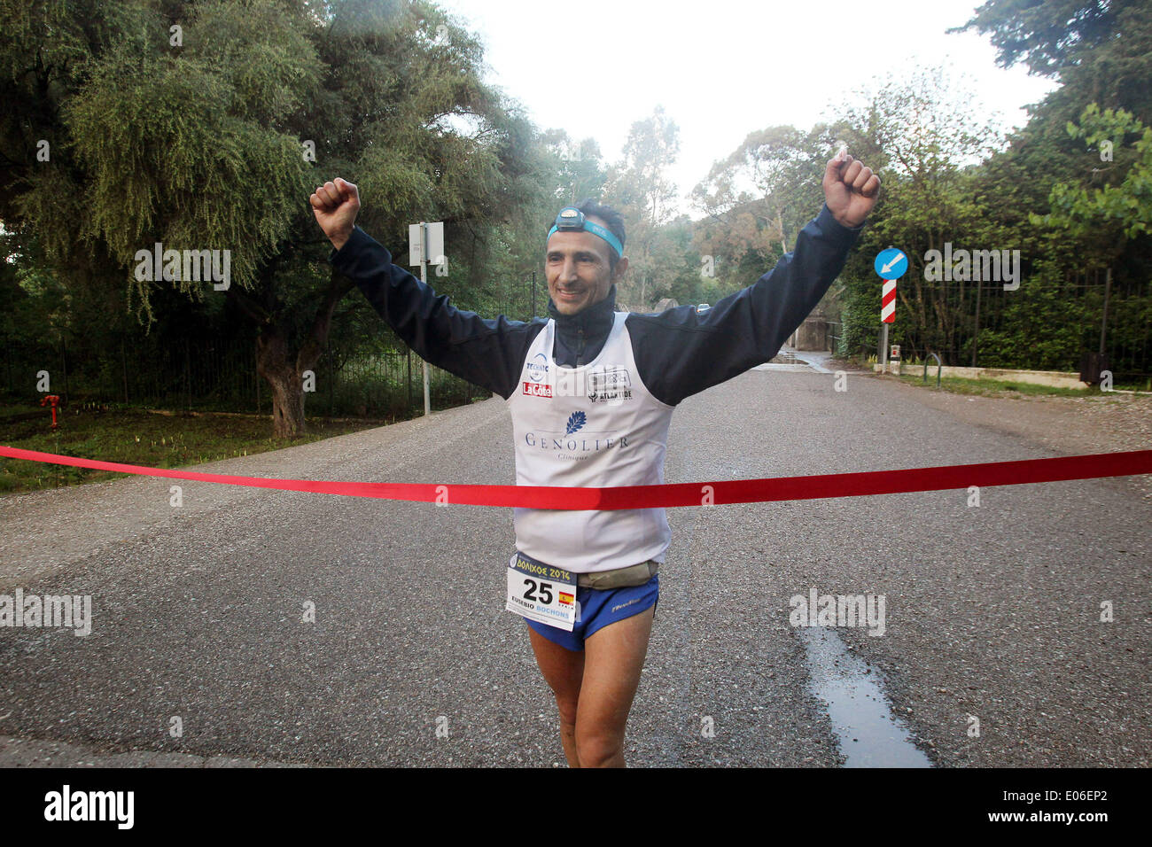 Athens, Greece. 4th May, 2014. Spanish athlete Eusebio Bochons reaches the finish line during the 3rd Dolichos Ultra Marathon in front of the archaeological site of Olympia, Greece, on May 4, 2014. A total of 26 athletes started on Friday running nonstop a 255 kilometers race from Delphi in mainland Greece to the birthplace of the Olympic Games. © Marios Lolos/Xinhua/Alamy Live News Stock Photo