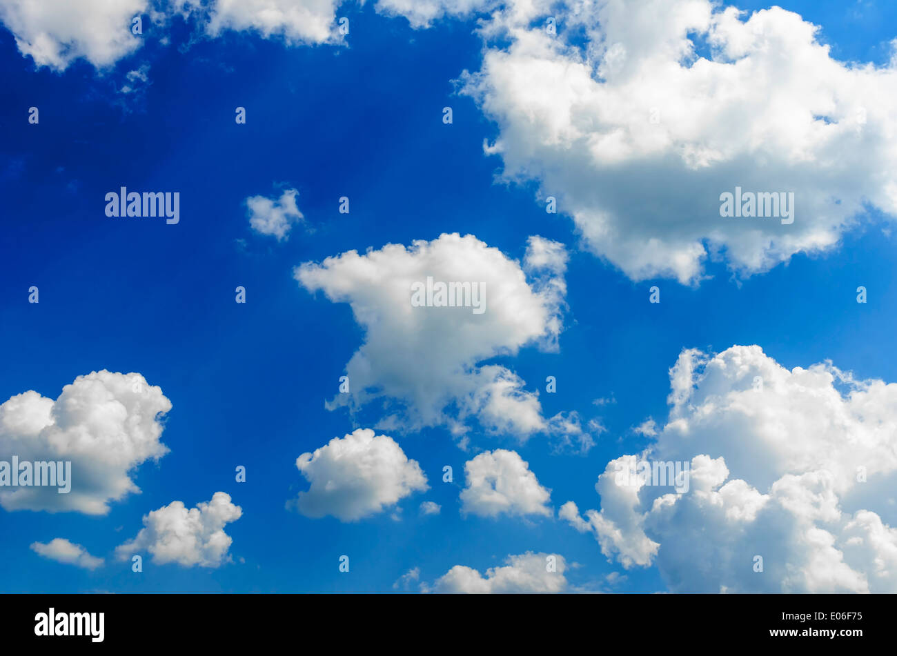 Blue sky and lots small clouds. Abstract background. Stock Photo
