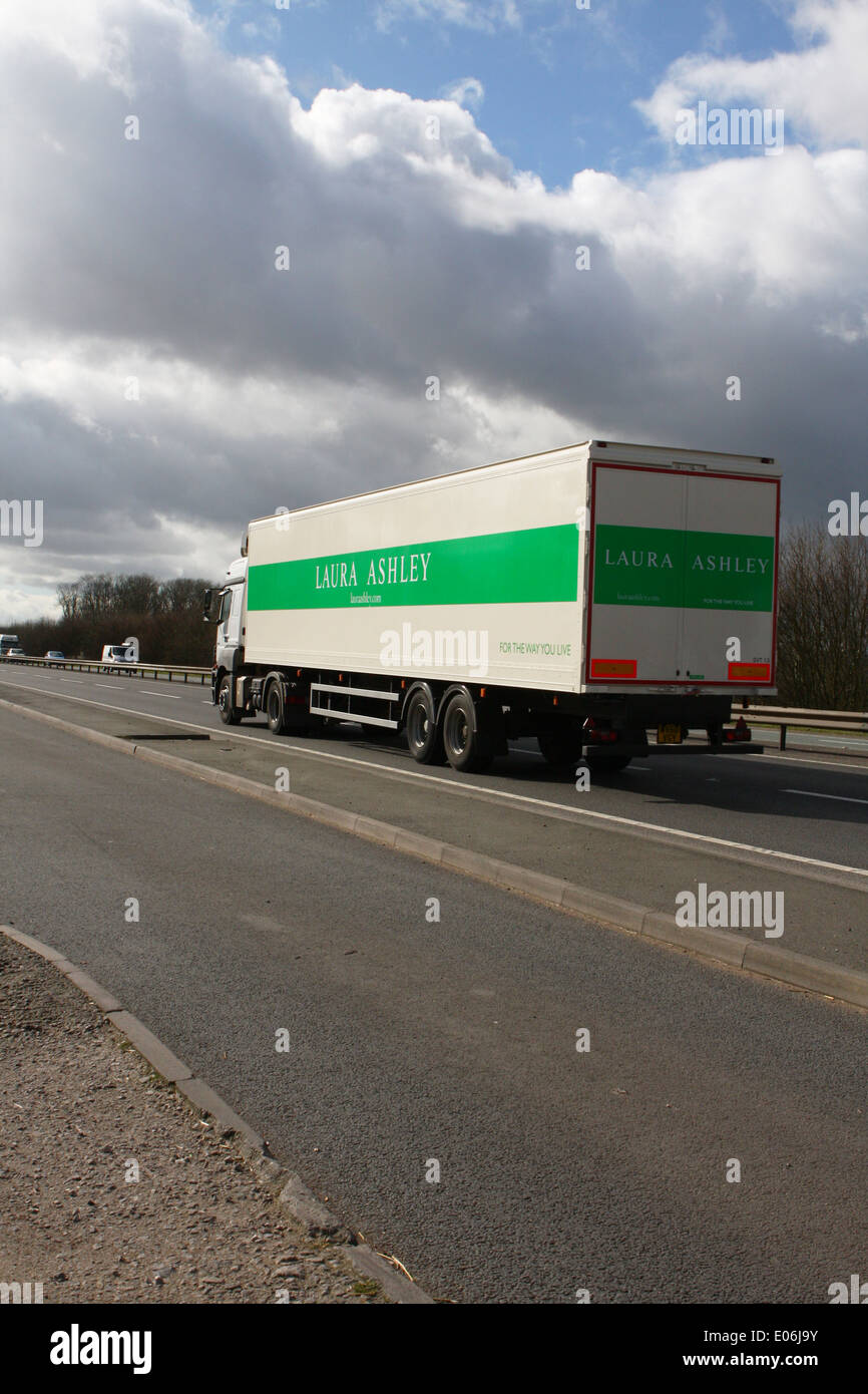 A Laura Ashley truck traveling along the A46 dual carriageway in