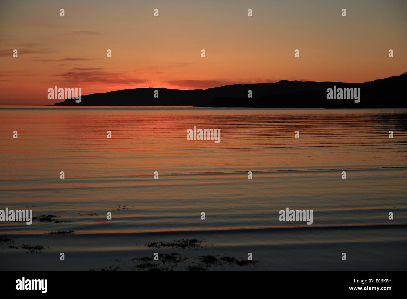 Sunset over the sea at Laggan Bay, Ulva, Isle of Mull, Scottish Islands, Scotland, UK. Stock Photo