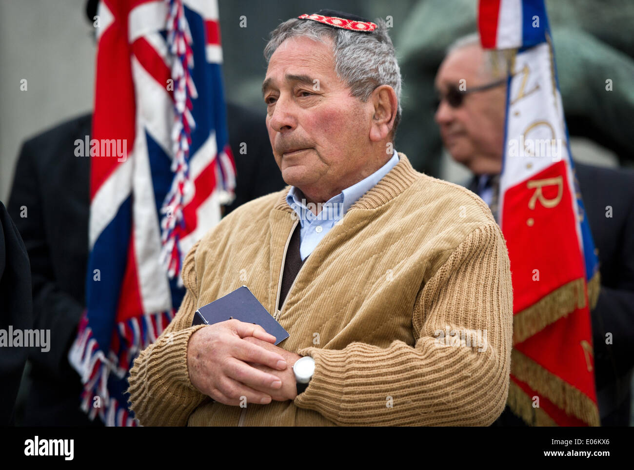 Oranienburg, Germany. 04th May, 2014. Menachem Taub from Israel, Sachsenhausen concentration camp survivor, sits during the ceremony to mark the 69th anniversary of the liberation of Sachsenhausen and Ravensbrueck concentration camps at Station Z in Oranienburg, Germany, 04 May 2014. The pupils want to turn a former prisoner of war camp into a memorial. The 69th anniversary of the liberation is celebrated on 04 May 2014. Photo: DANIEL NAUPOLD/dpa/Alamy Live News Stock Photo