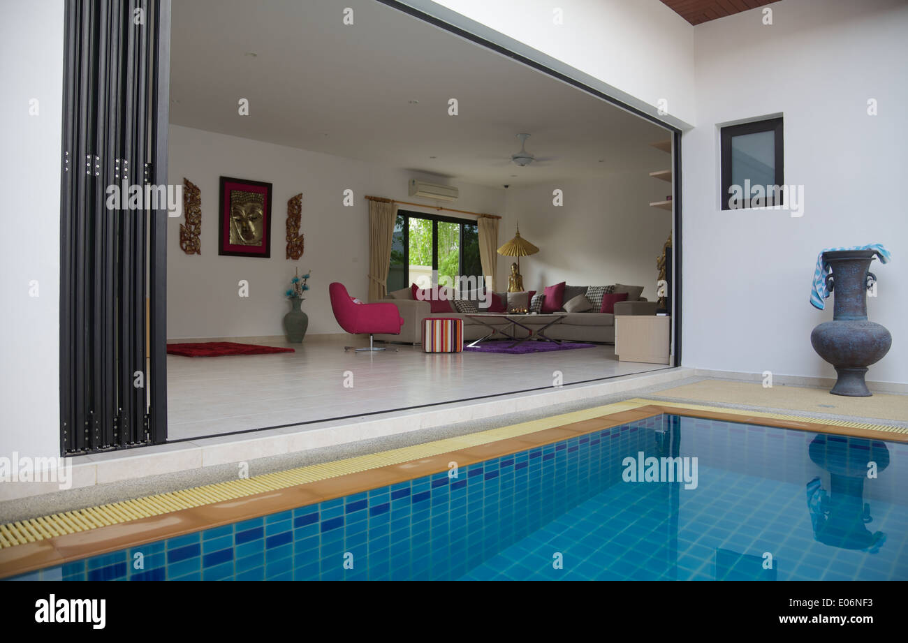 Folding doors on a house in Phuket, Thailand Stock Photo Alamy