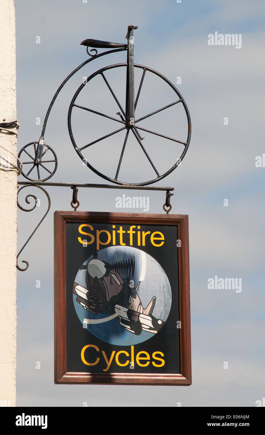 Bike shop sign in the form of a penny farthing bicycle Barnard Castle north east England UK Stock Photo