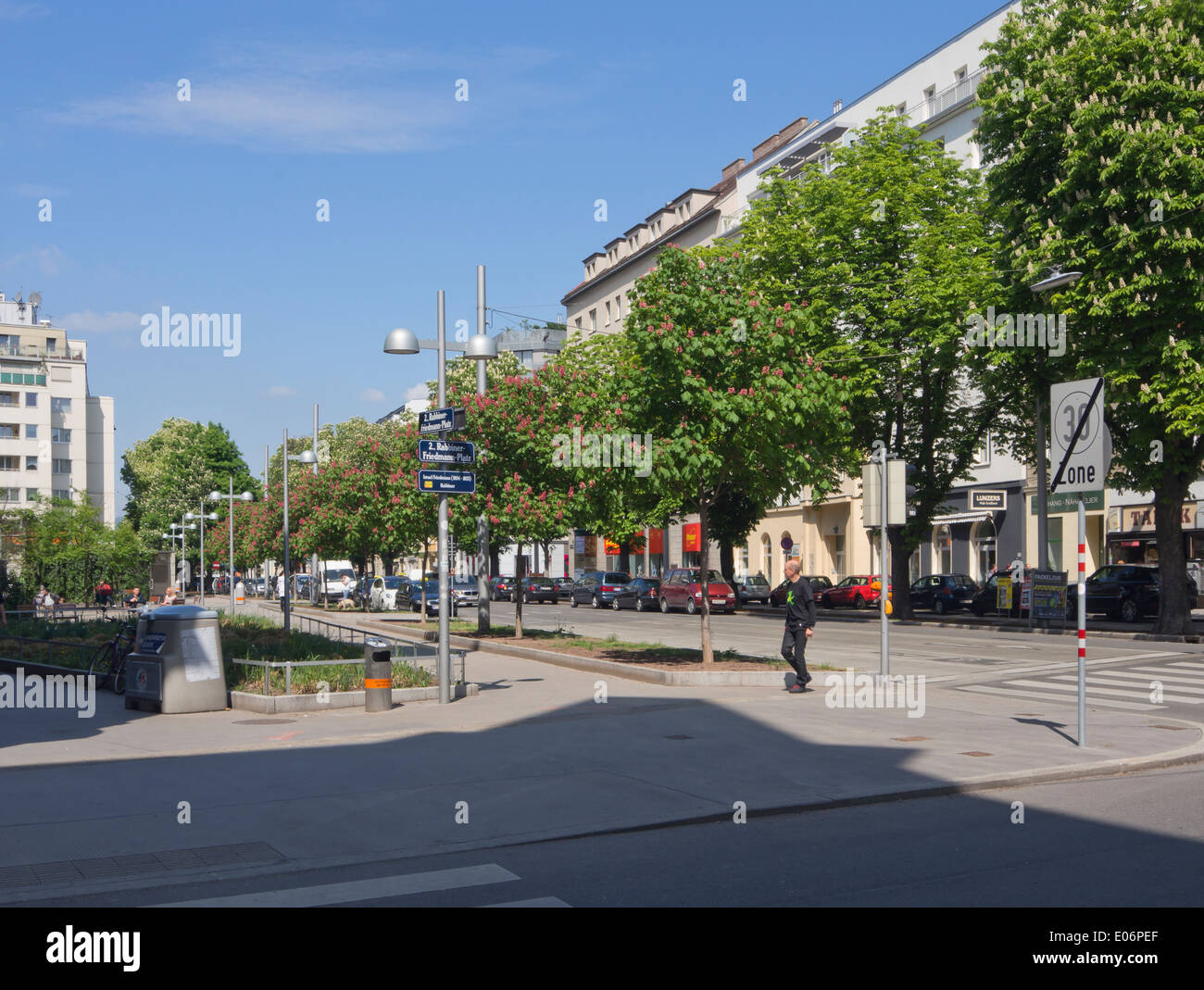 Rabbiner Friedmann Platz, a green city square in Vienna Austria with a horse-chestnut tree avenue Stock Photo