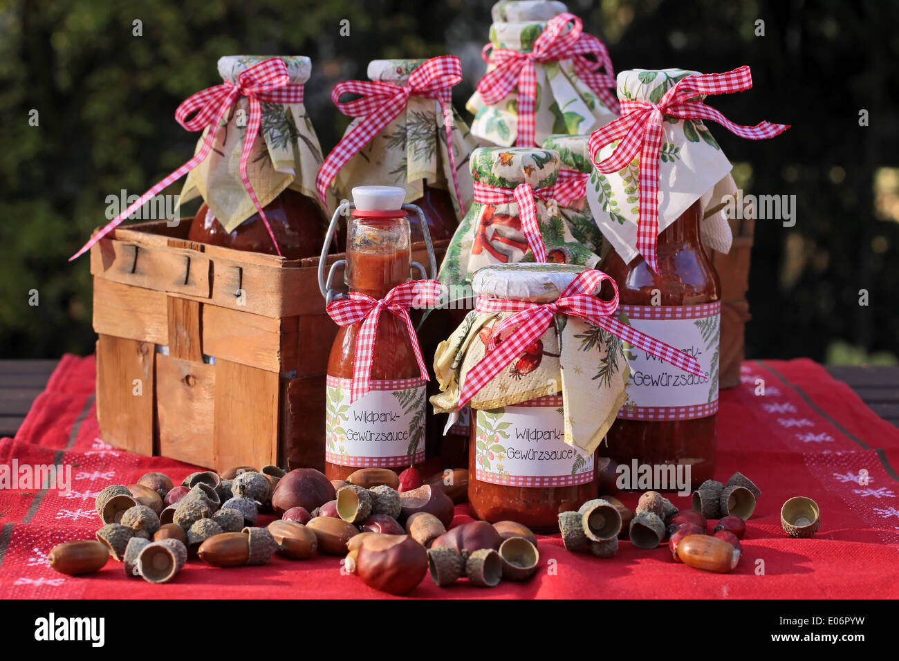 Glasses with homemade sauces and country house decoration Stock Photo