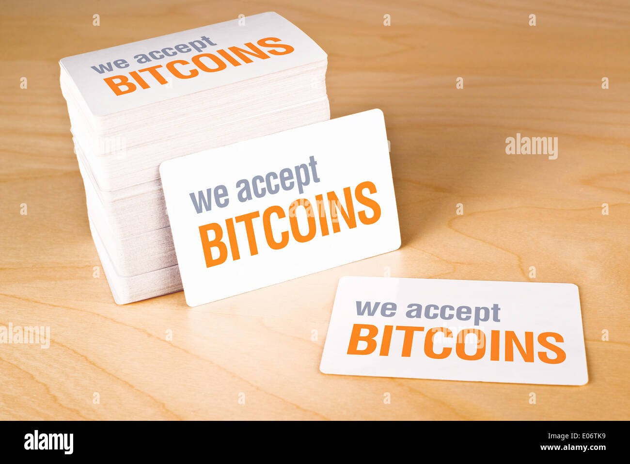 We accept bitcoins Business cards with rounded corners. Stack of blank horizontal business cards propped up another. Stock Photo