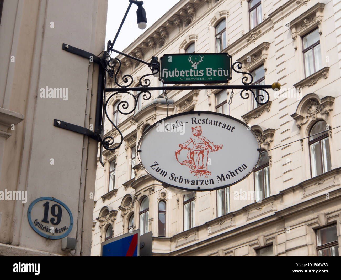 Street corner with retro  restaurant sign, Zum Schwarzen Mohren,  Spittelberg Neubau Vienna Austria Stock Photo