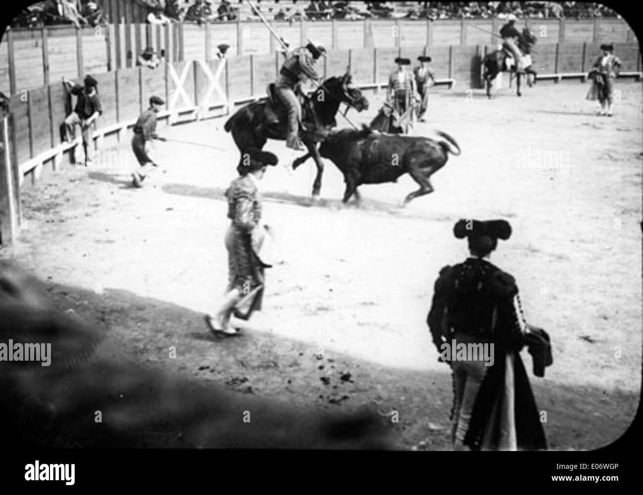 Torero Ritual This photograph shows the bullfighting arena, featuring picadores ...