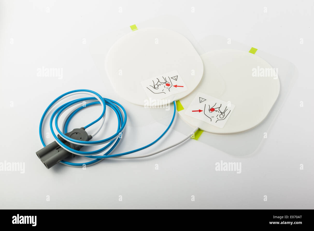 a pair of automatic defibrillator patches on a white table Stock Photo Alamy