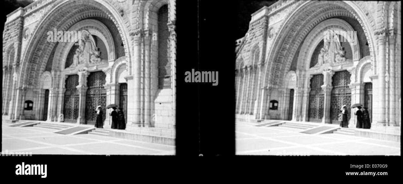 A photograph of the Rosary Porch in Lourdes, taken on July 13, 1906. The image captures the architectural beauty of this religious structure located at the Lourdes sanctuary. Stock Photo