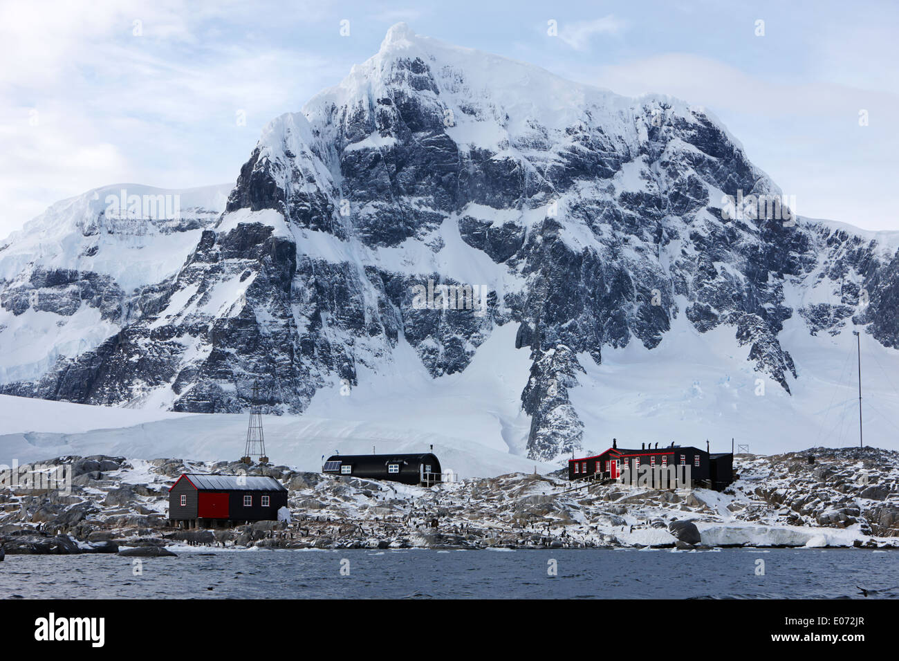 port lockroy british antarctic heritage trust station on goudier island with luigi peak in the background Antarctica Stock Photo