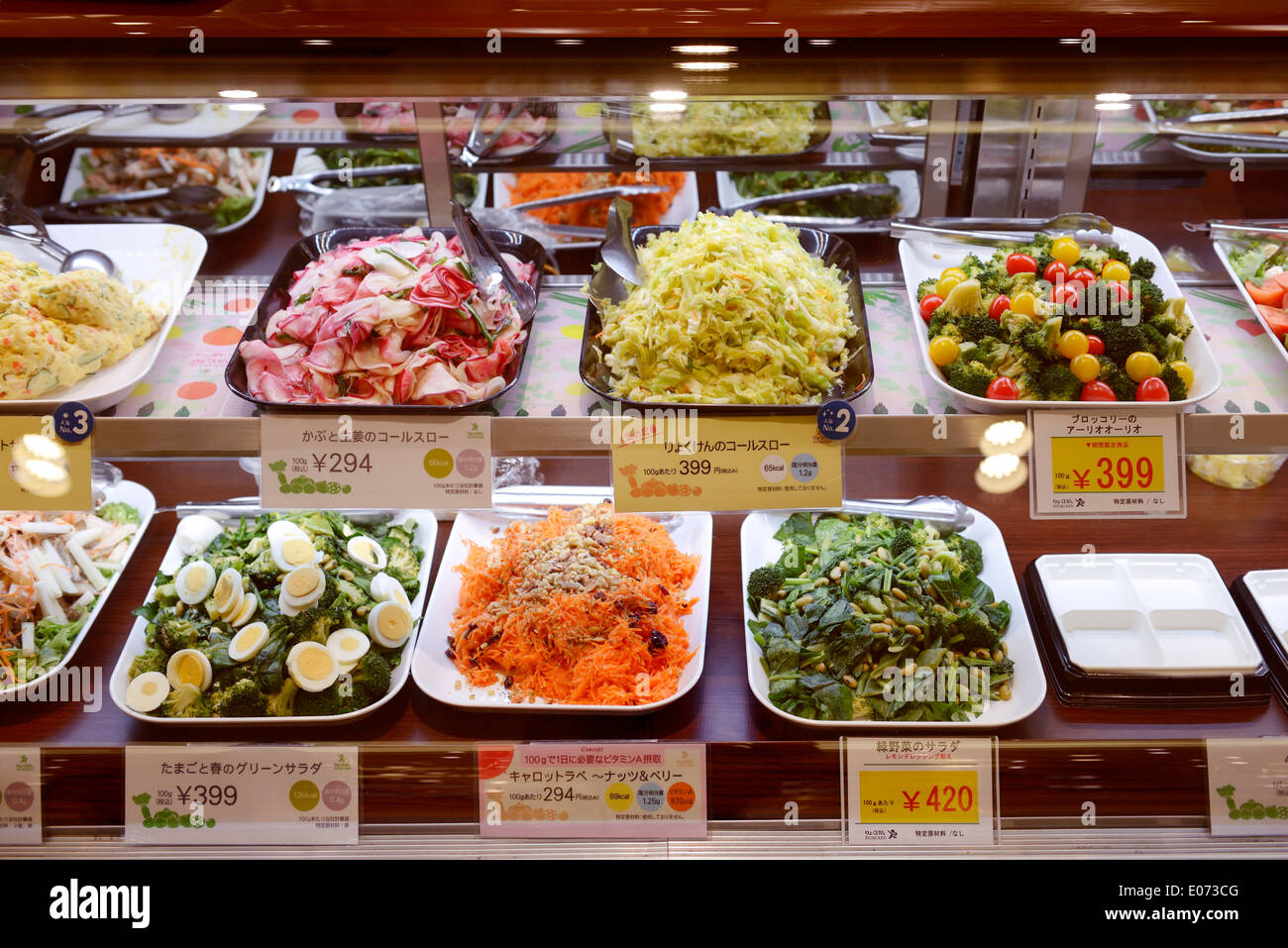Salads on display in a supermarket. Tokyo, Japan. Stock Photo