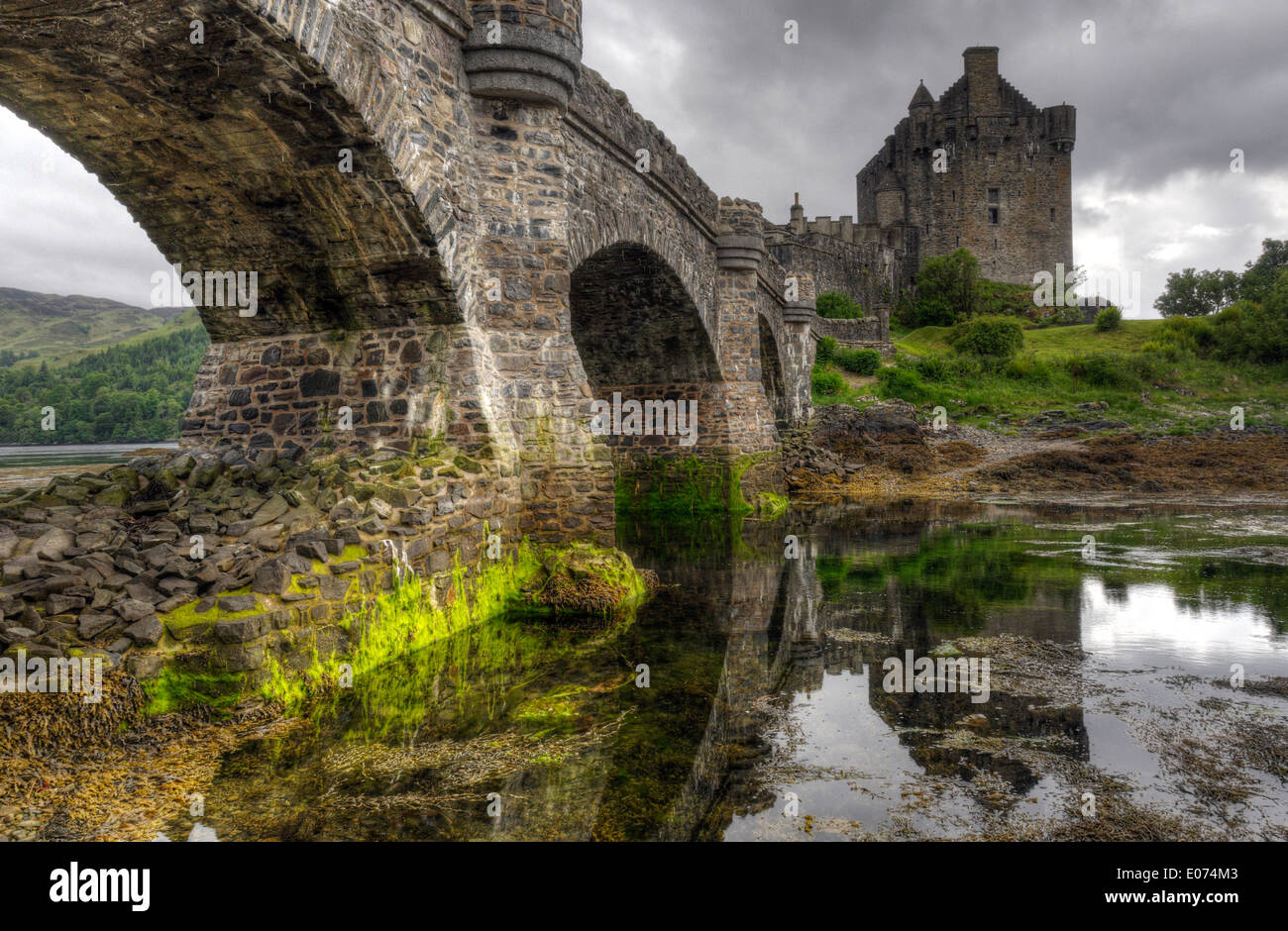 Dramatic lighting on Eilean Donan Castle in Scotland Stock Photo