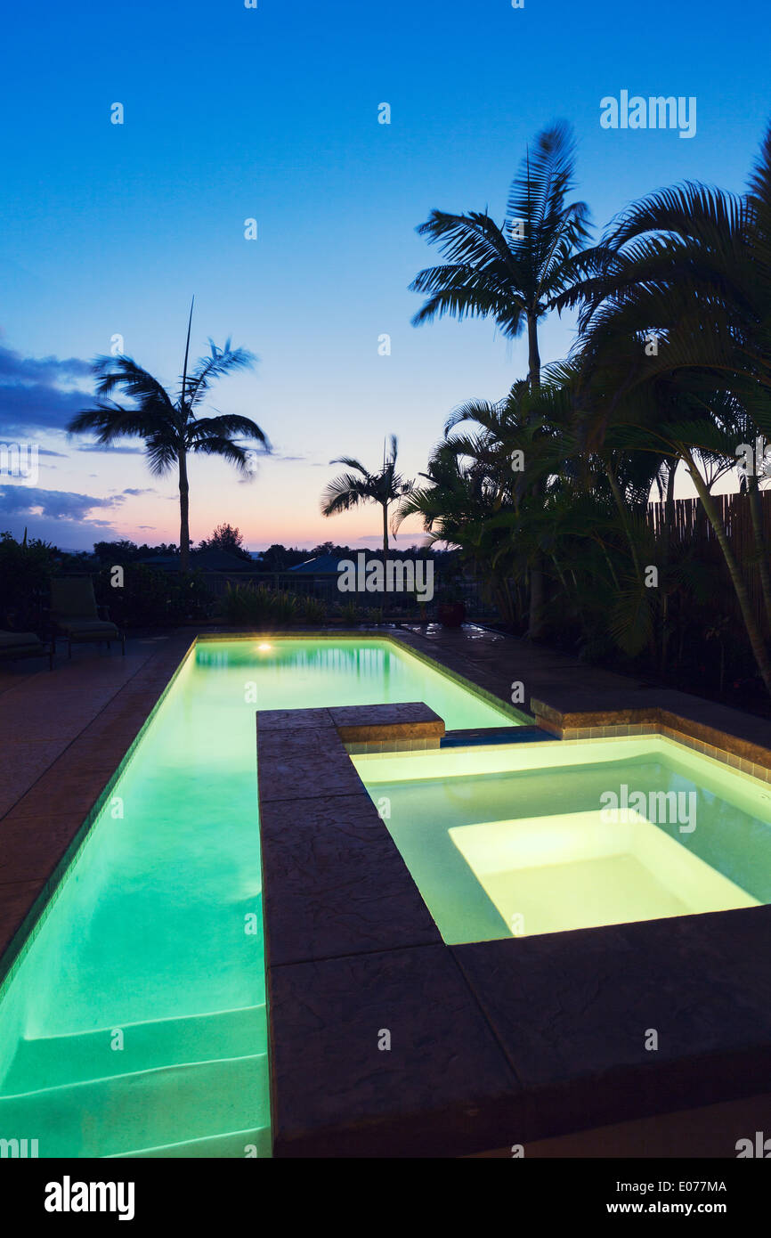 Luxury Home with Pool and Hot Tub at Sunset Stock Photo