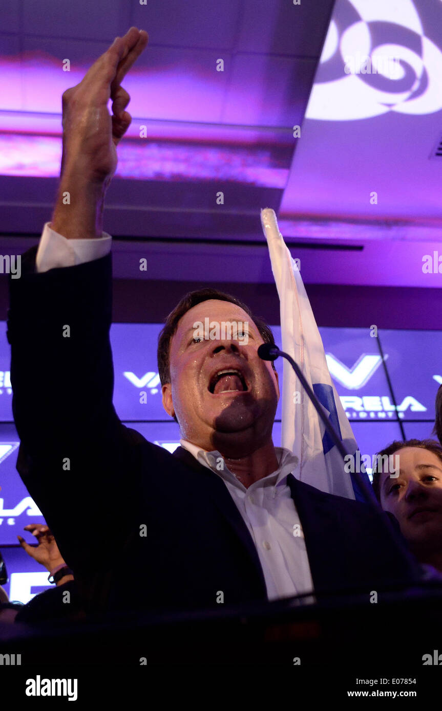 Panama City, Panama. 4th May, 2014. Presidential candidate Juan Carlos Varela(C) from the Panamenista Party gives a speech after the preliminary results of the general elections, in Panama City, capital of Panama, on May 4, 2014. President of the Supreme Electoral Court Erasmo Pinilla said on Sunday night that Juan Carlos Varela is the virtual winner of Panama's presidency. © Mauricio Valenzuela/Xinhua/Alamy Live News Stock Photo