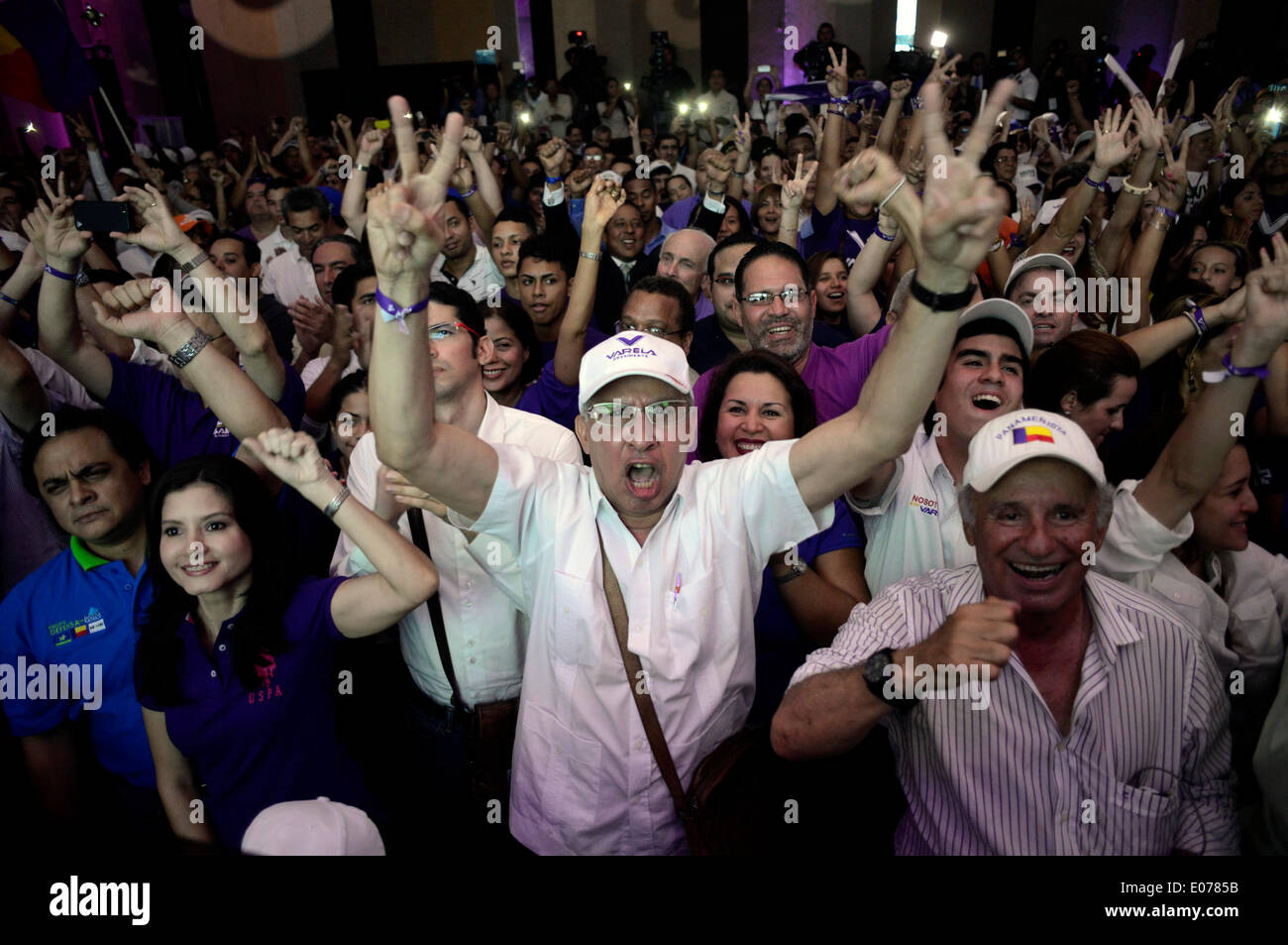 Panama City, Panama. 4th May, 2014. Supporters of presidential candidate Juan Carlos Varela from the Panamenista Party react after the preliminary results of the general elections, in Panama City, capital of Panama, on May 4, 2014. President of the Supreme Electoral Court Erasmo Pinilla said on Sunday night that Juan Carlos Varela is the virtual winner of Panama's presidency. © Mauricio Valenzuela/Xinhua/Alamy Live News Stock Photo