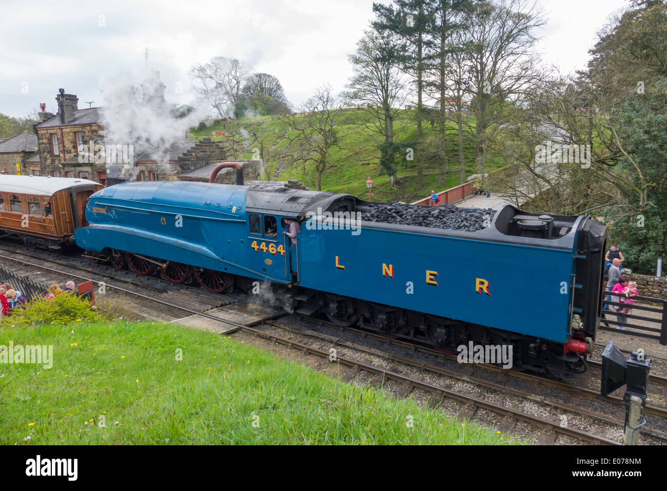 Steam locomotive 4464 'Bittern' pulling away from Goathland on the North Yorkshire Moors Railway May 2014 Stock Photo