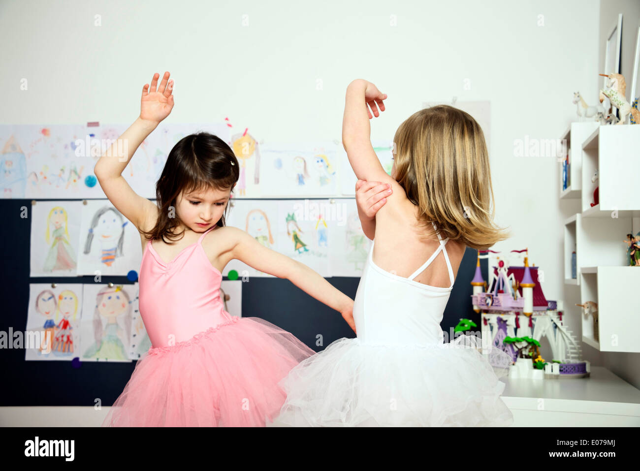 Two little ballerinas exercising together Stock Photo