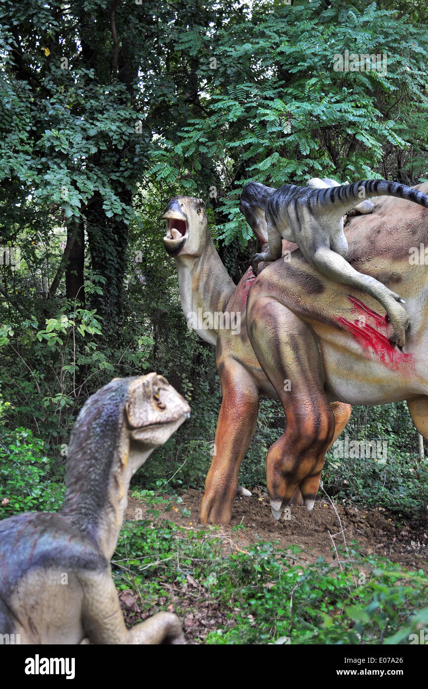 Realistic scene of two dinosaurs hunting Stock Photo - Alamy
