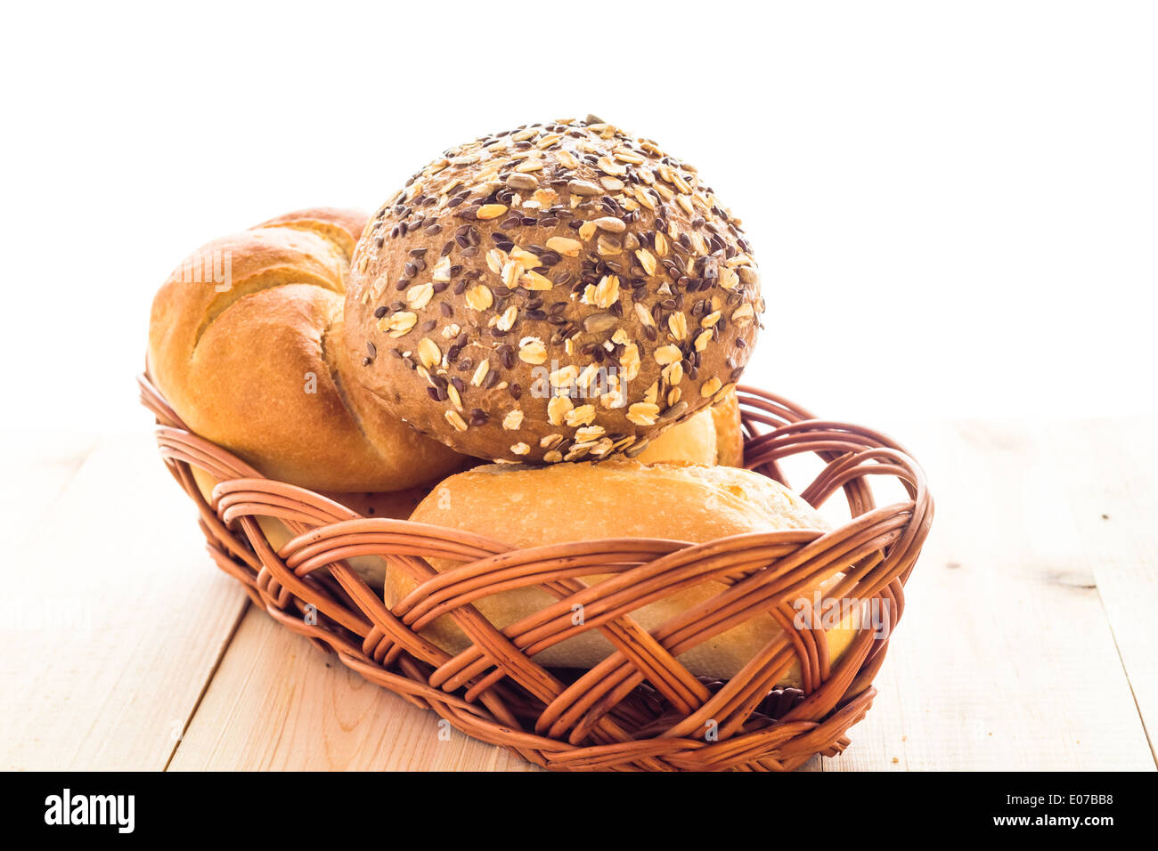Wicker basket with different types of bread rolls Stock Photo Alamy