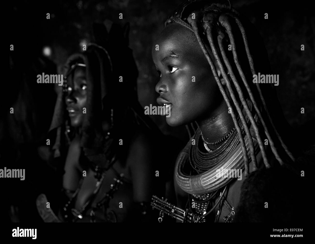 Himba Women Inside Their Hut, Epupa, Namibia Stock Photo