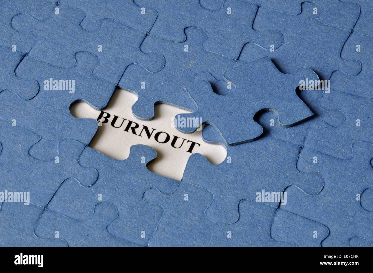 Illustration - The word 'Burnout' is read under a missing piece of a jigsaw puzzle in Germany, 27 April 2011. Fotoarchiv für ZeitgeschichteS. Steinach - NO WIRE SERVICE Stock Photo