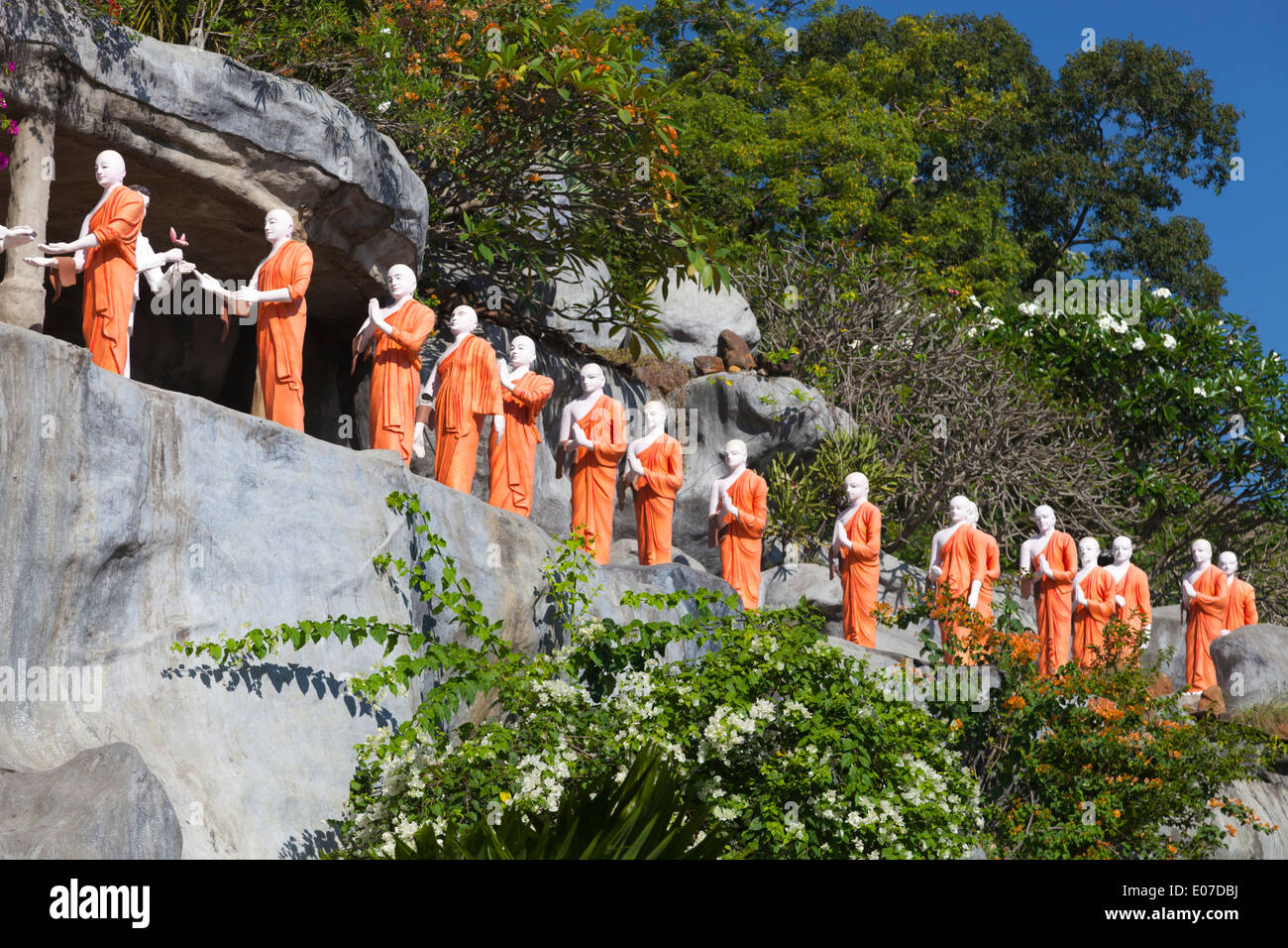 Plaster pilgrims on the hillside by the Golden Temple in Dambulla, Sri Lanka 2 Stock Photo