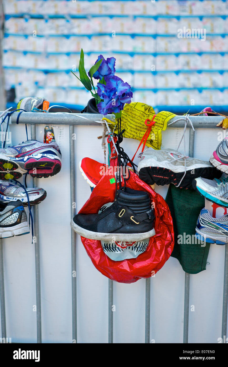 Trainers, Memorial to the victims of the 2013 Boston Marathon Bombings. Copley Square. Boston. Stock Photo