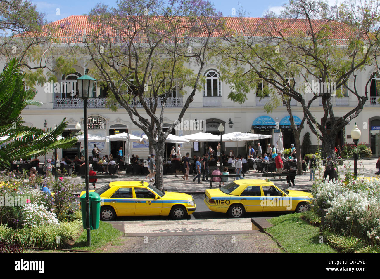 Taxis at Avenida Arriaga Funchal Madeira The Ritz restaurant in background Stock Photo