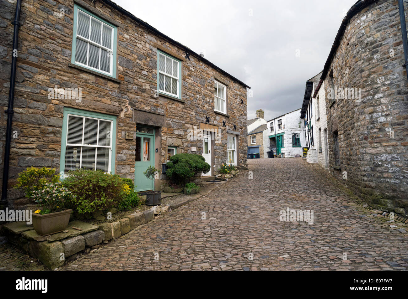 The cobbled main street, the village of Dent, Cumbria, UK, situated in
