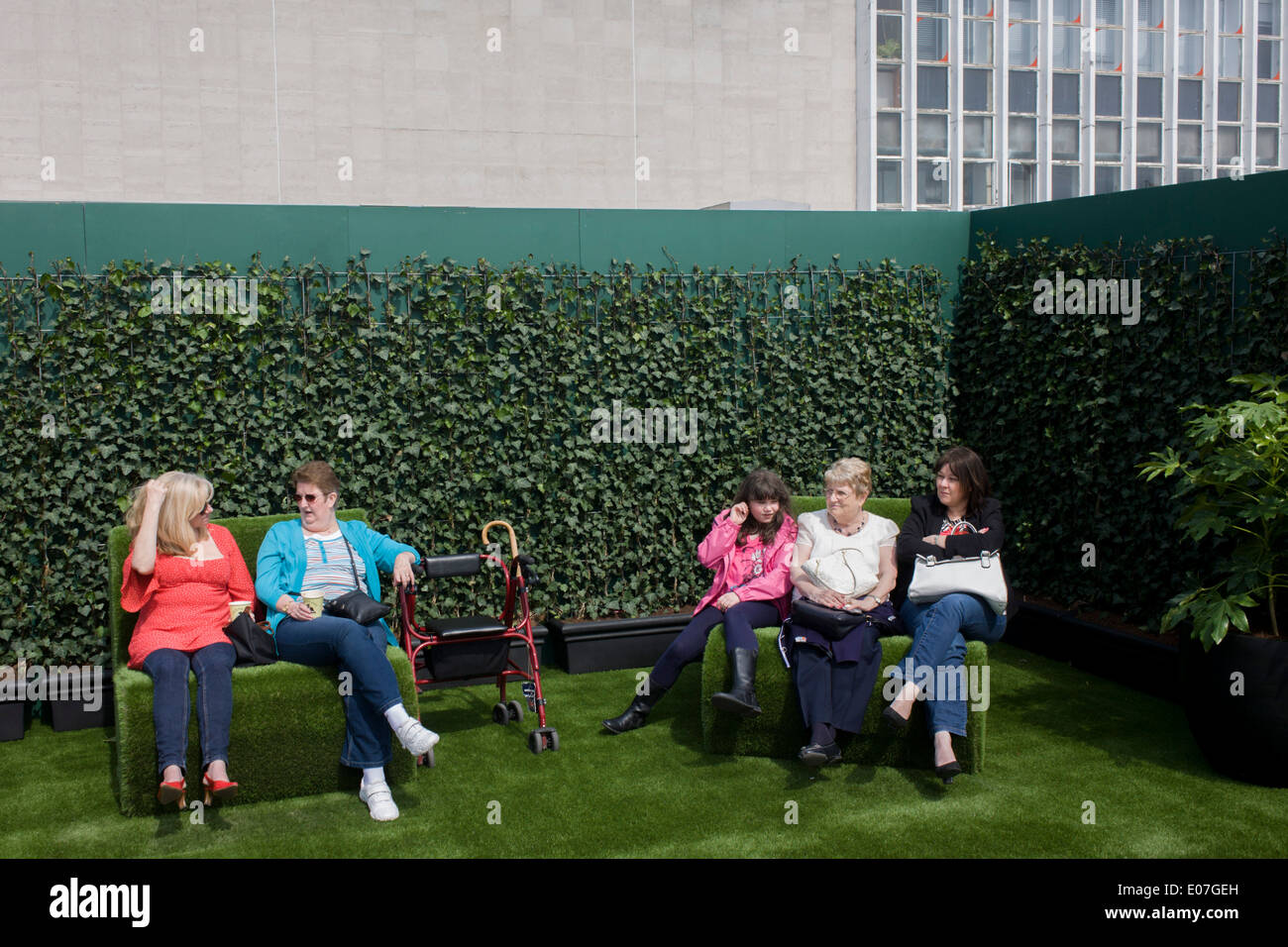 Shoppers enjoy the new John Lewis open air roof garden above their London Oxford Street branch