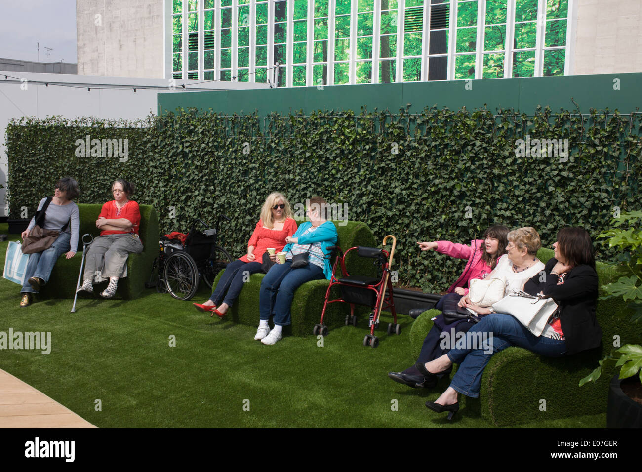 Shoppers enjoy the new John Lewis open air roof garden above their London Oxford Street branch