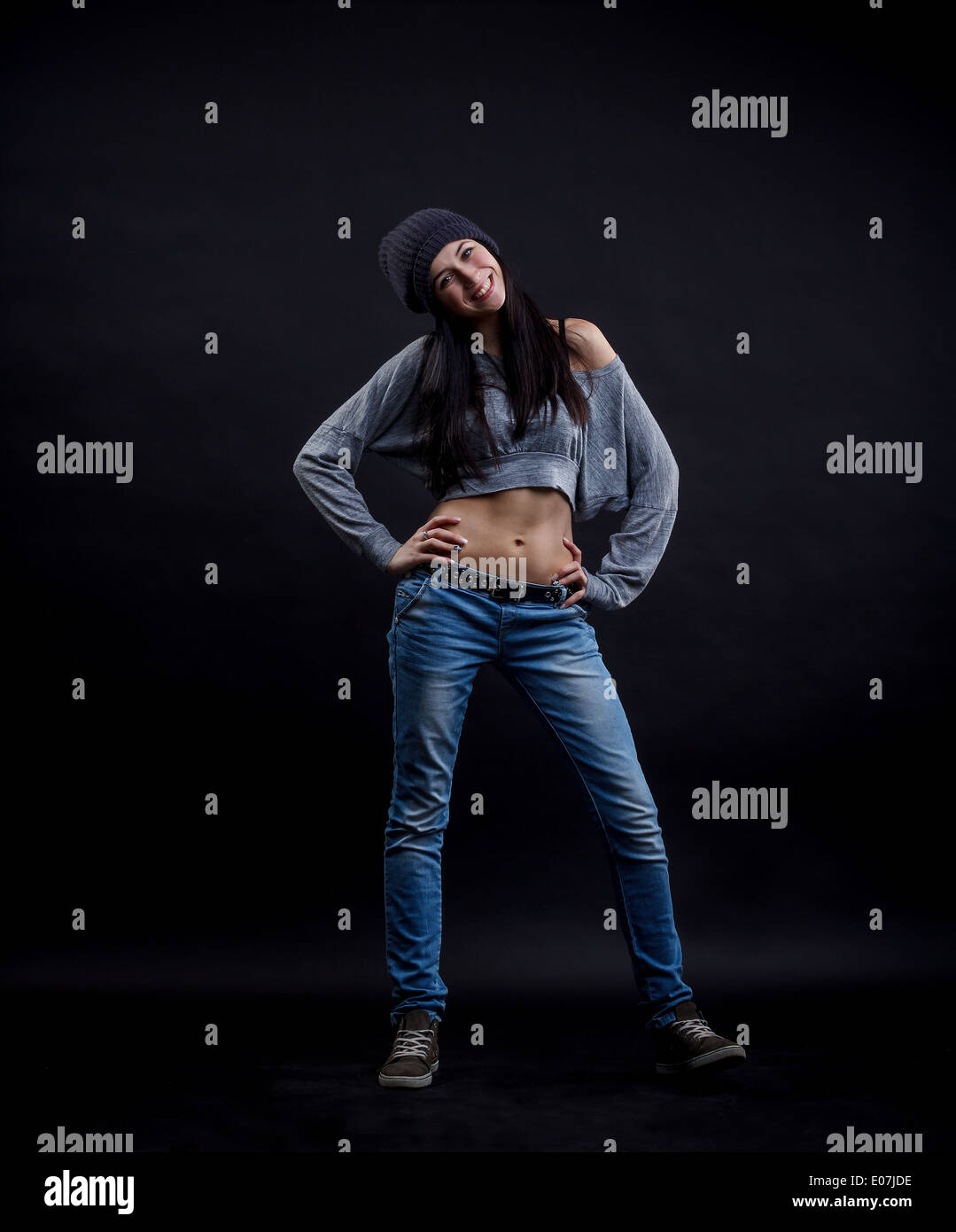 Studio portrait of a female hip hop dancer posing Stock Photo - Alamy