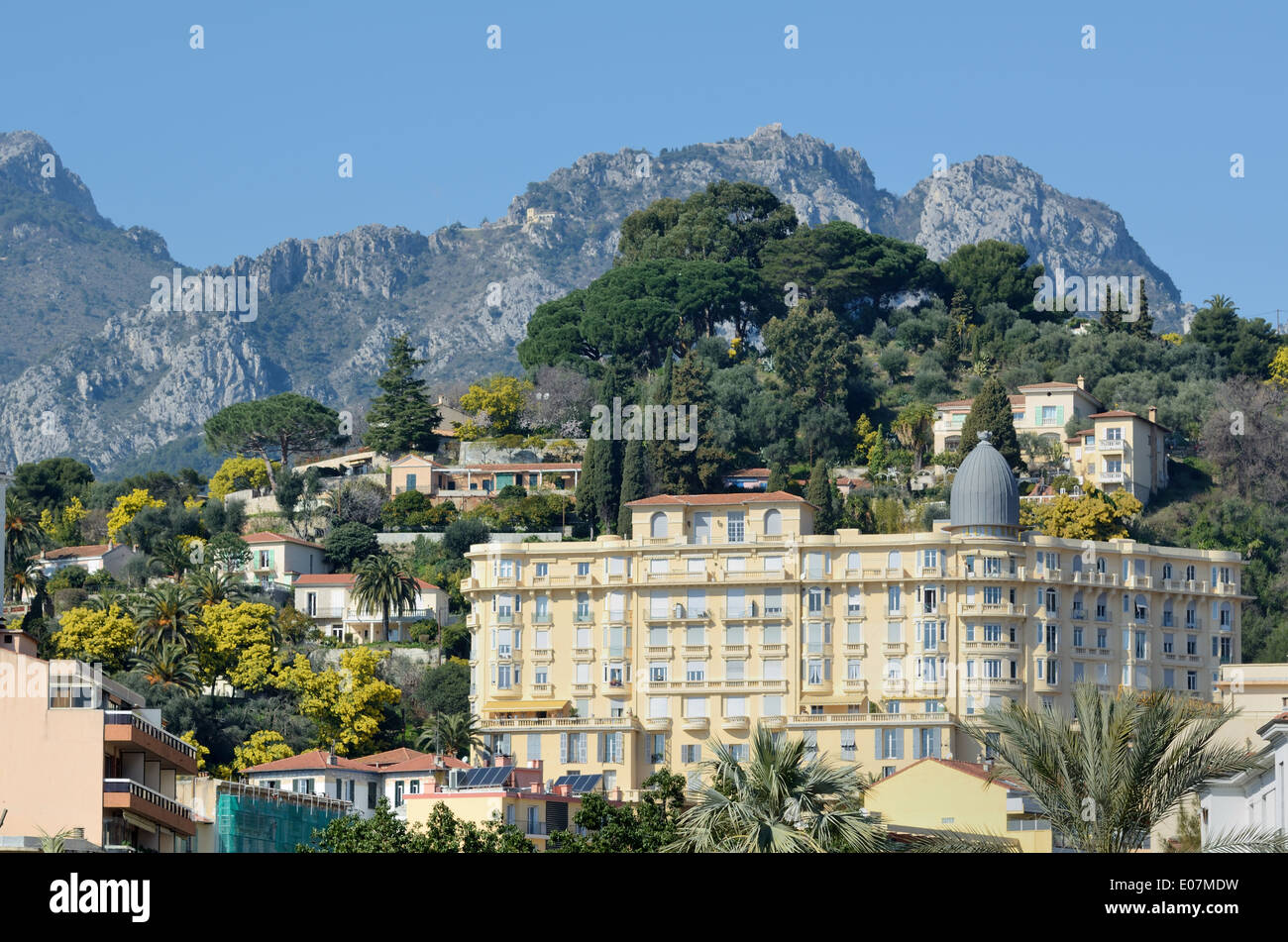Belle Epoch or Belle Epoque Architecture, and Lower Alps or Rocky Hillside Behind Menton Alpes-Maritimes France Stock Photo