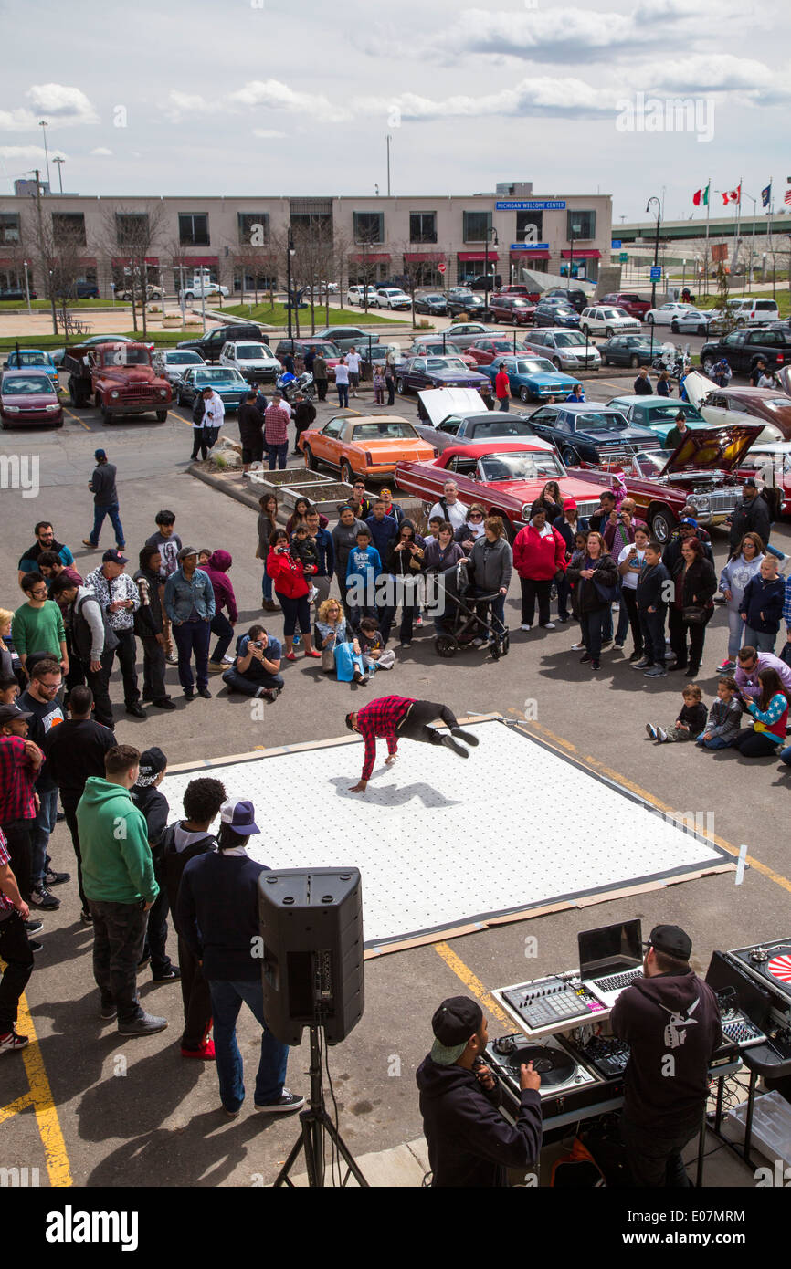 Detroit, Michigan - A breakdance demonstration at the Blessing of the Lowriders. Stock Photo
