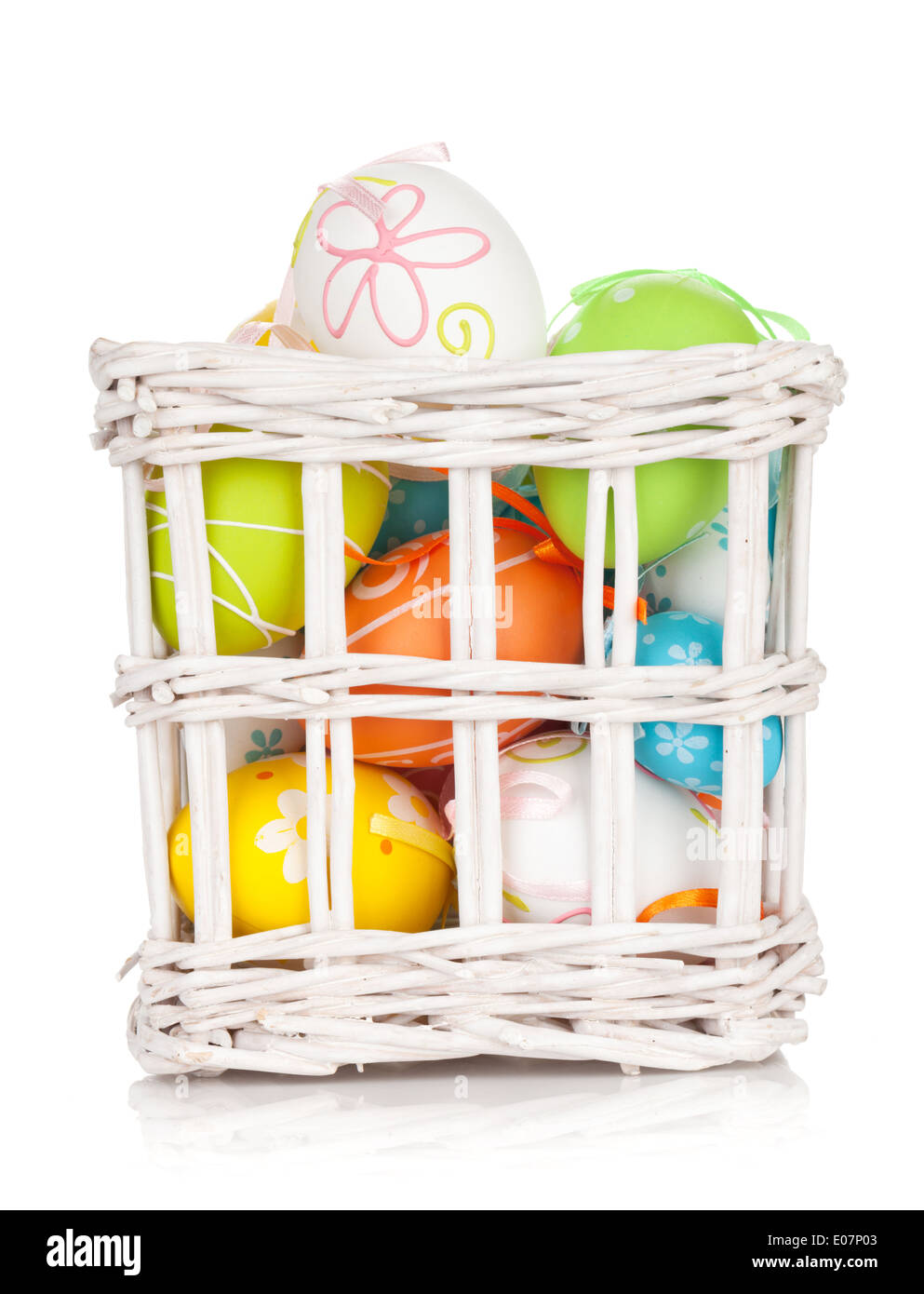 Colorful easter eggs basket. Isolated on white background Stock Photo ...