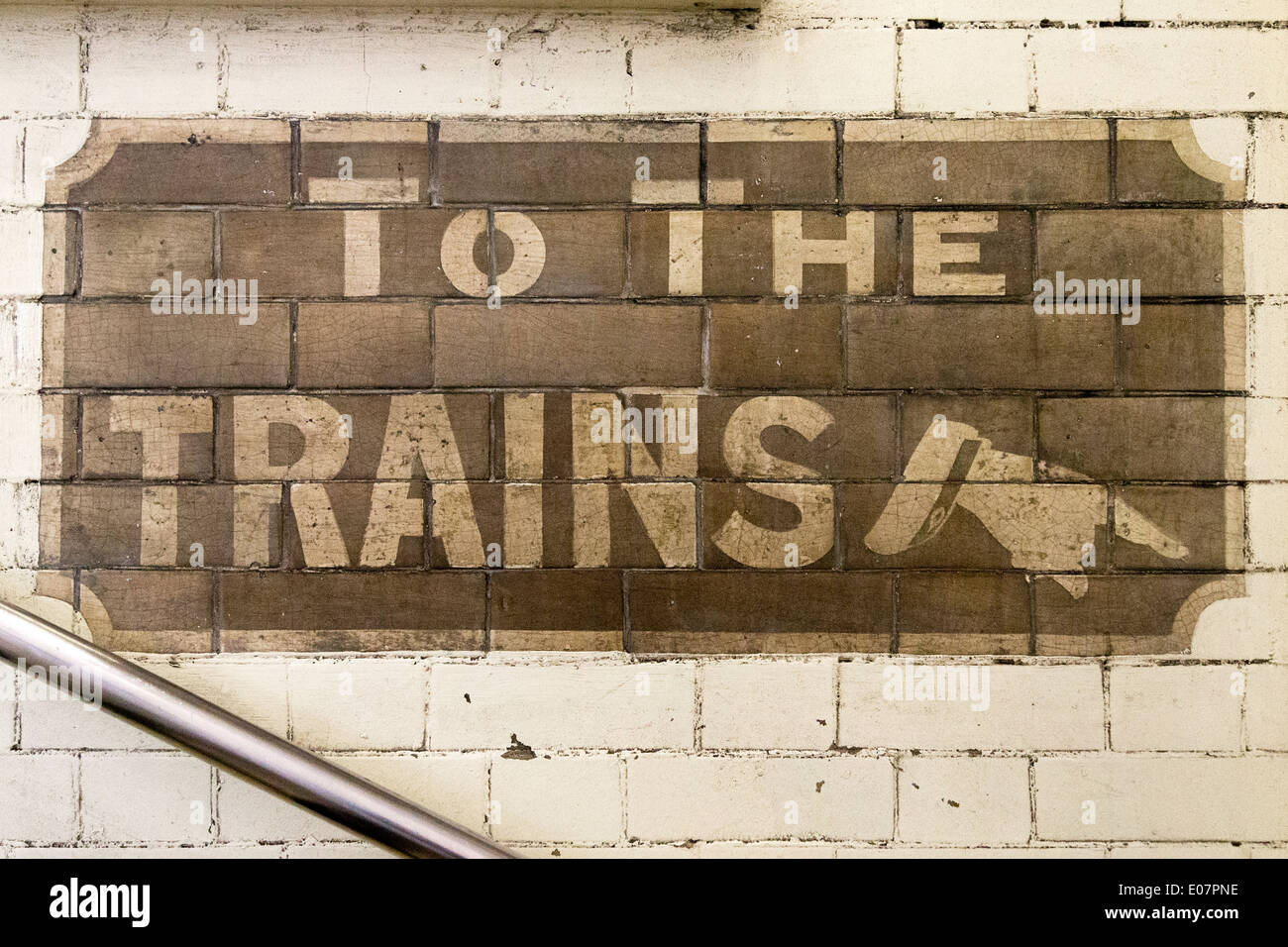 To the Trains sign, Stepney Green underground station, London, England, UK. Stock Photo