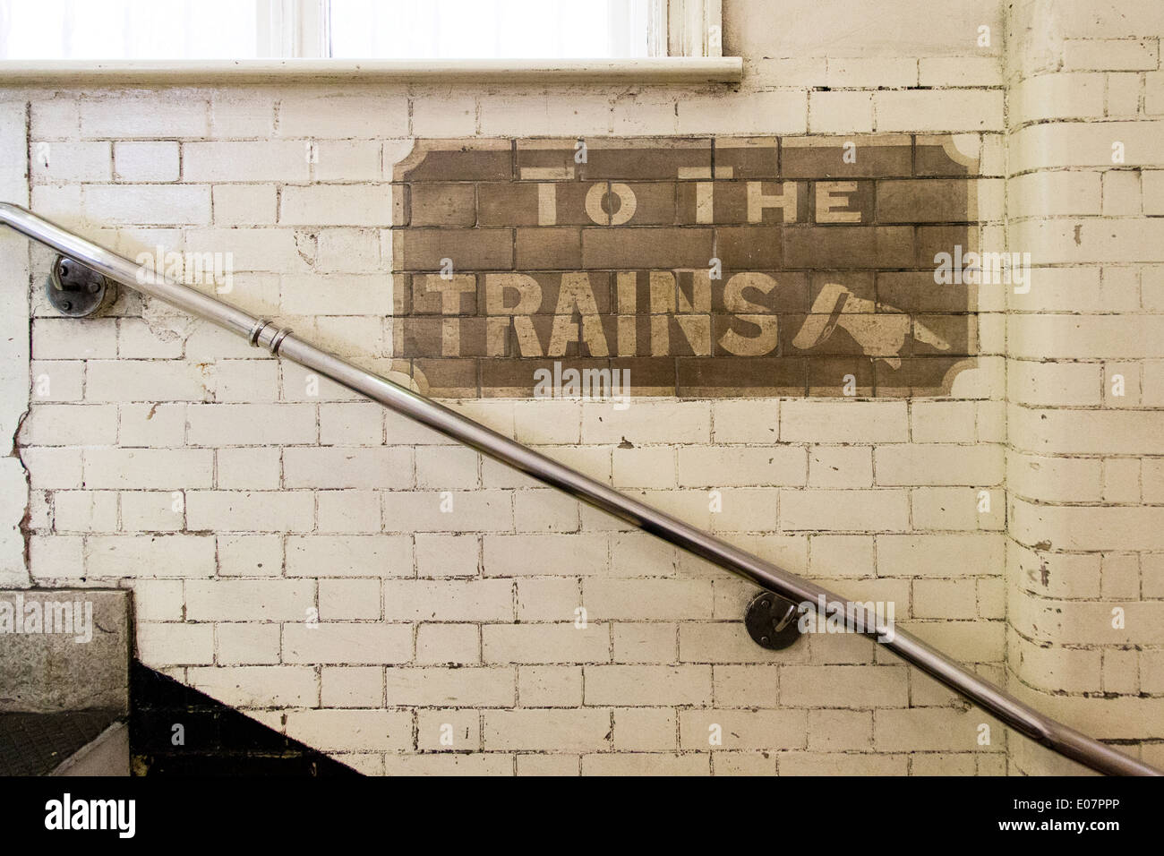 To the Trains sign, Stepney Green underground station, London, England, UK. Stock Photo