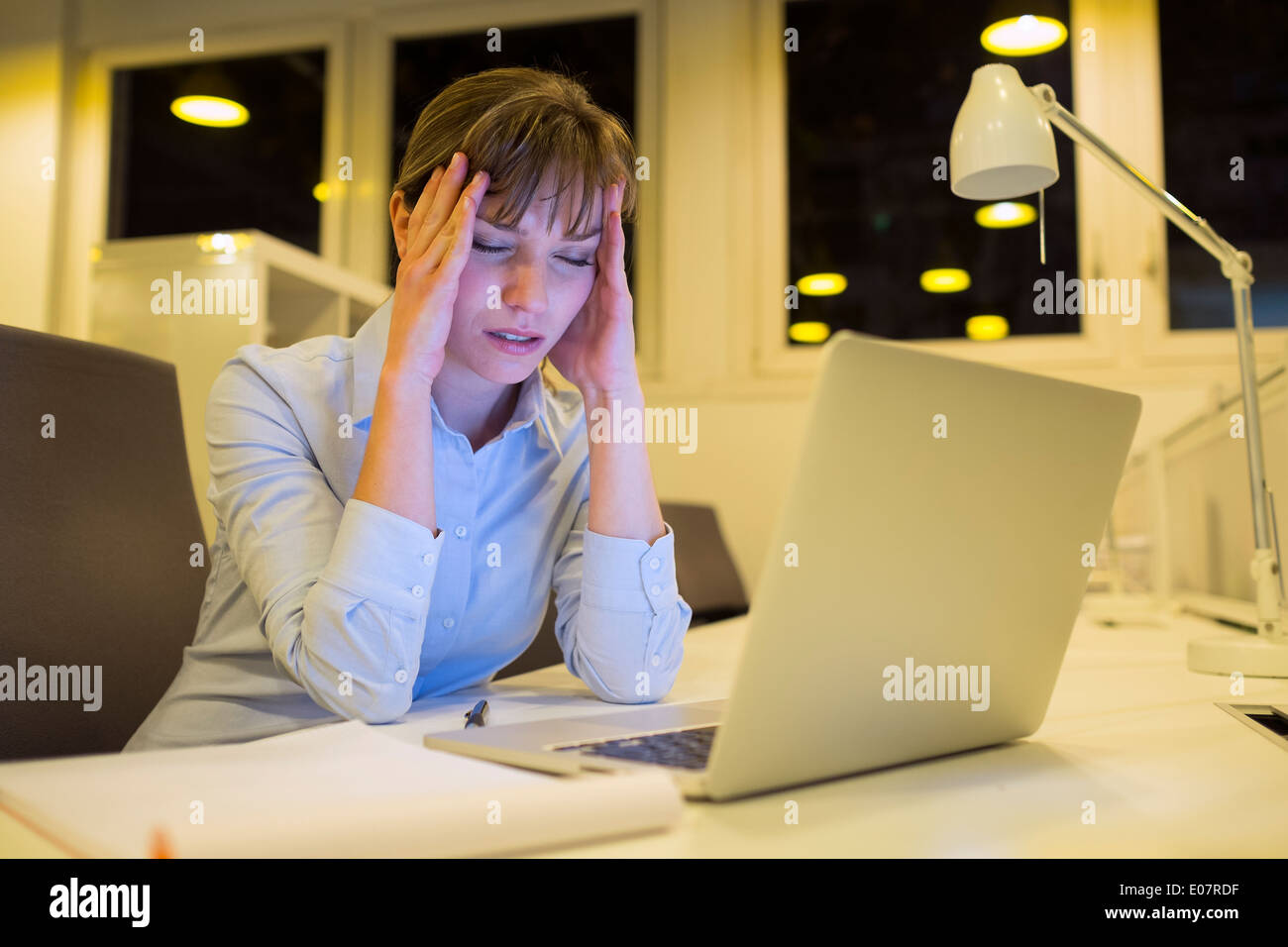 Female business tired working late startup student desk Stock Photo