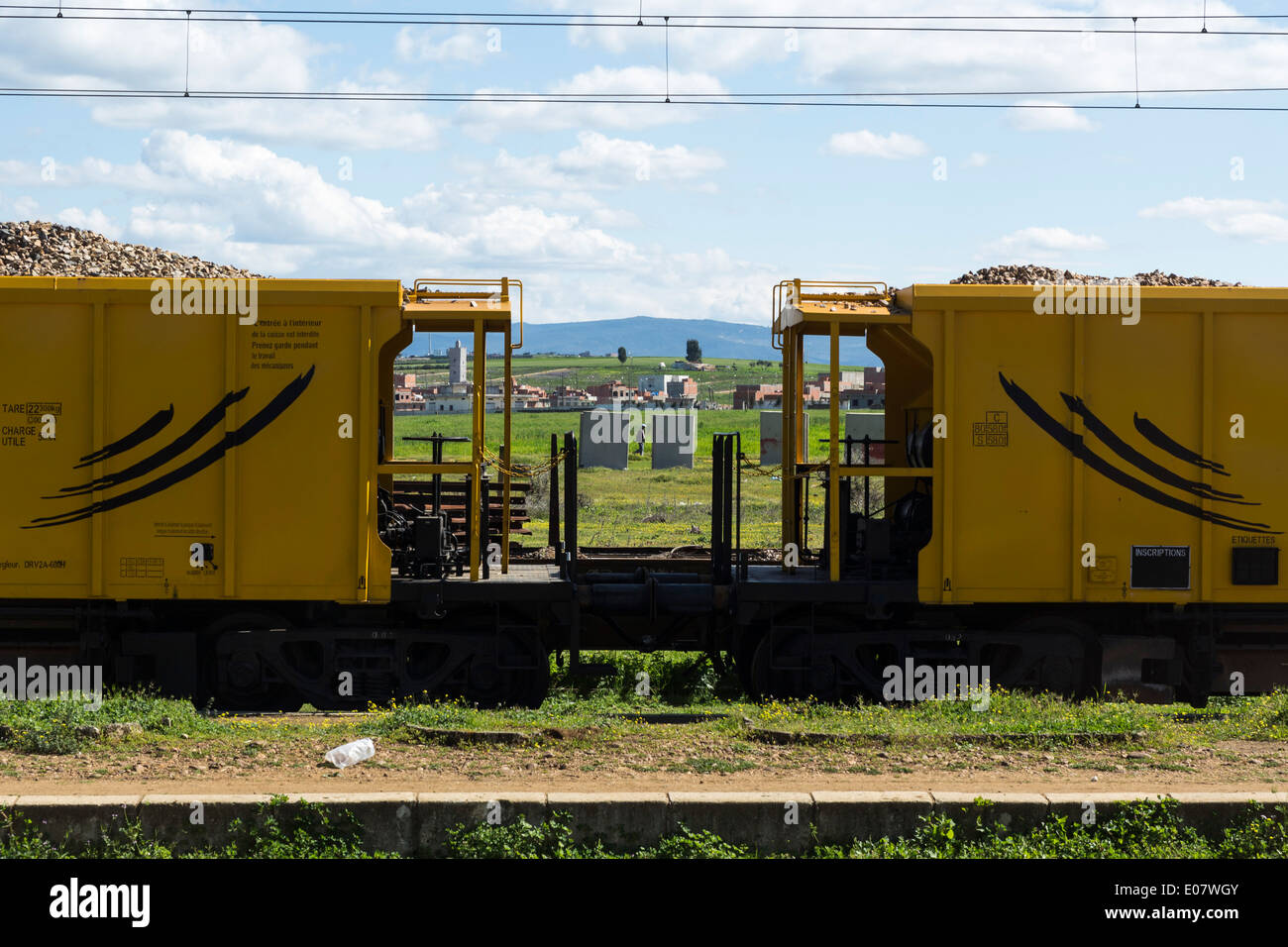 Yellow train in the countryside, Morocco Stock Photo