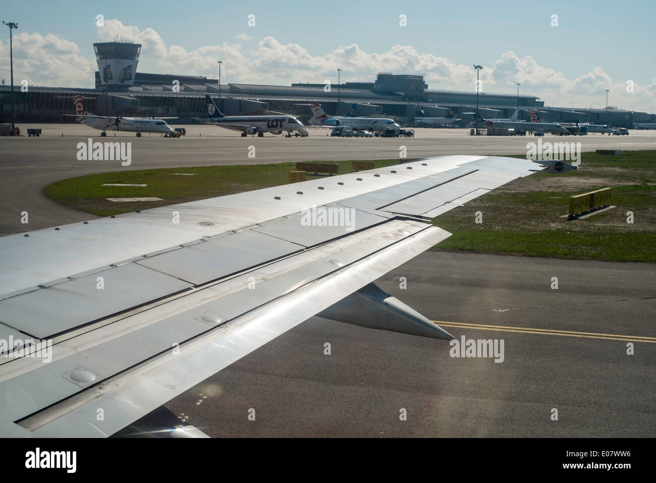 airplane plane landing airport wing runway, Warsaw, Poland Stock Photo